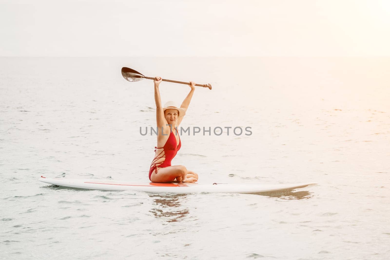 young woman in stylish bikini lying on seashore, closeup. Holiday, vacation and recreational concept.