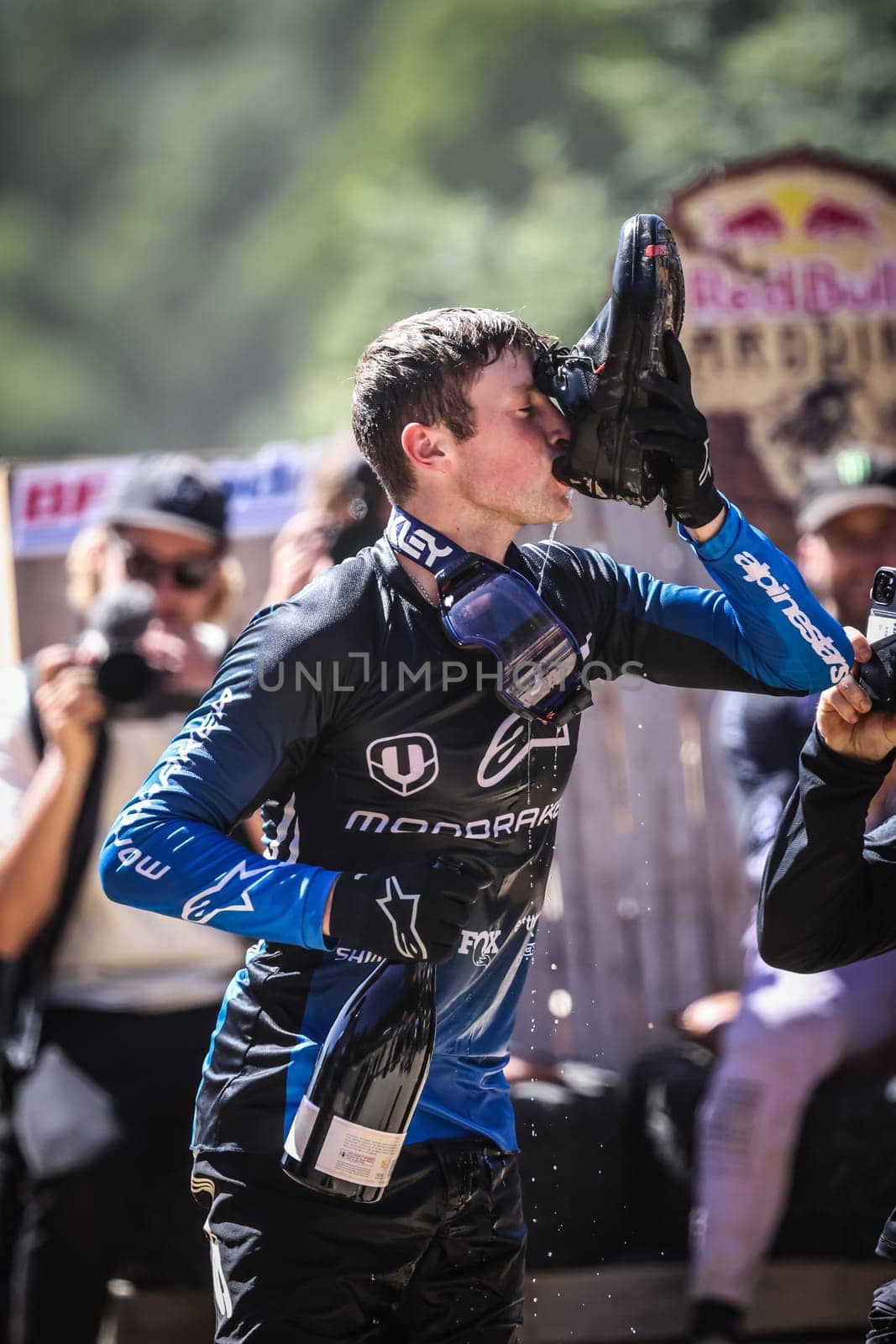 MAYDENA, AUSTRALIA - FEBRUARY 24: Ronan Dunne of Ireland celebrates his win by doing a shoey at Red Bull Hardline Tasmania on February 24, 2024 in Maydena, Australia.