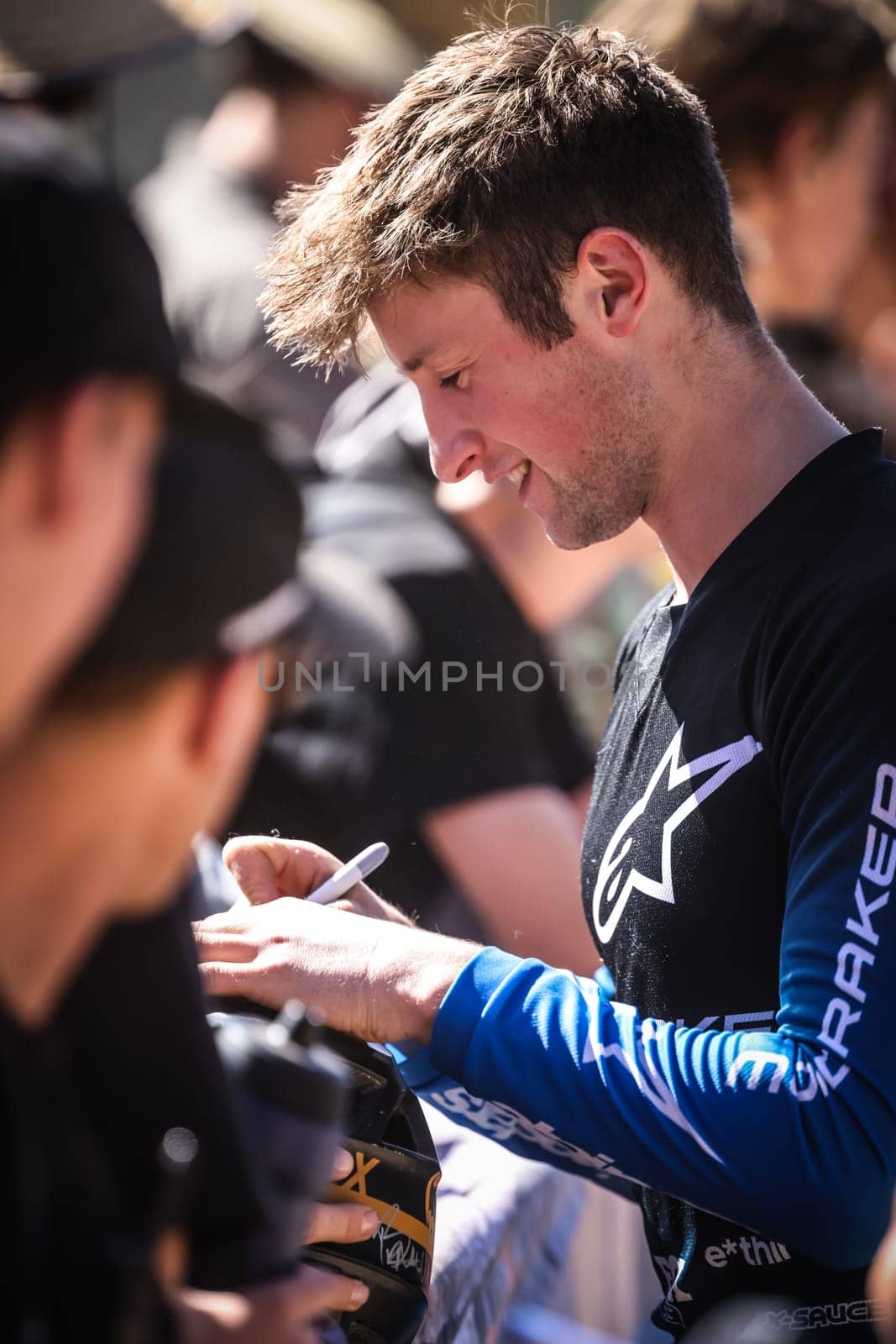 MAYDENA, AUSTRALIA - FEBRUARY 24: Ronan Dunne of Ireland with fans after winning Red Bull Hardline Tasmania on February 24, 2024 in Maydena, Australia.