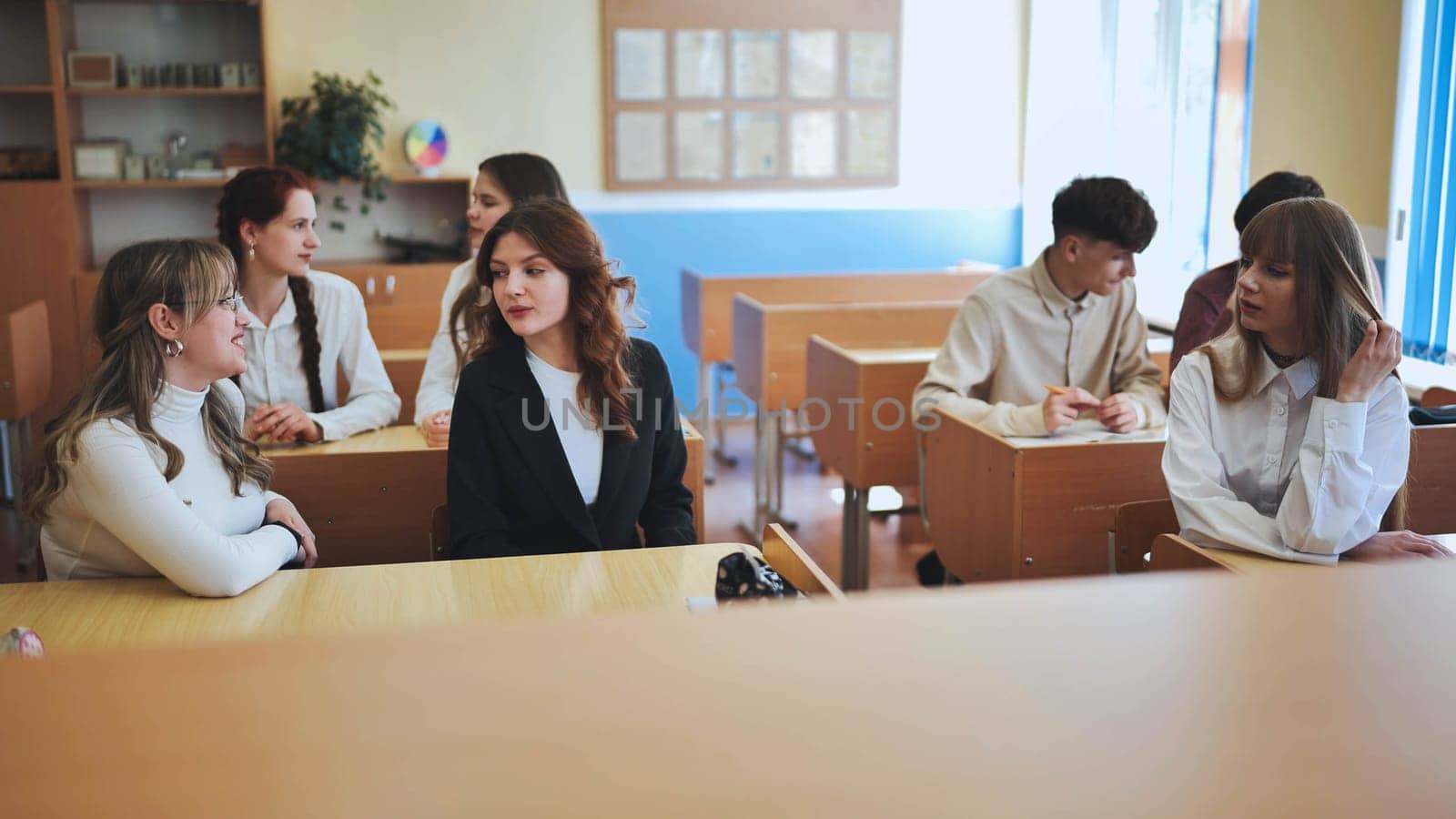 High school seniors in the classroom. by DovidPro