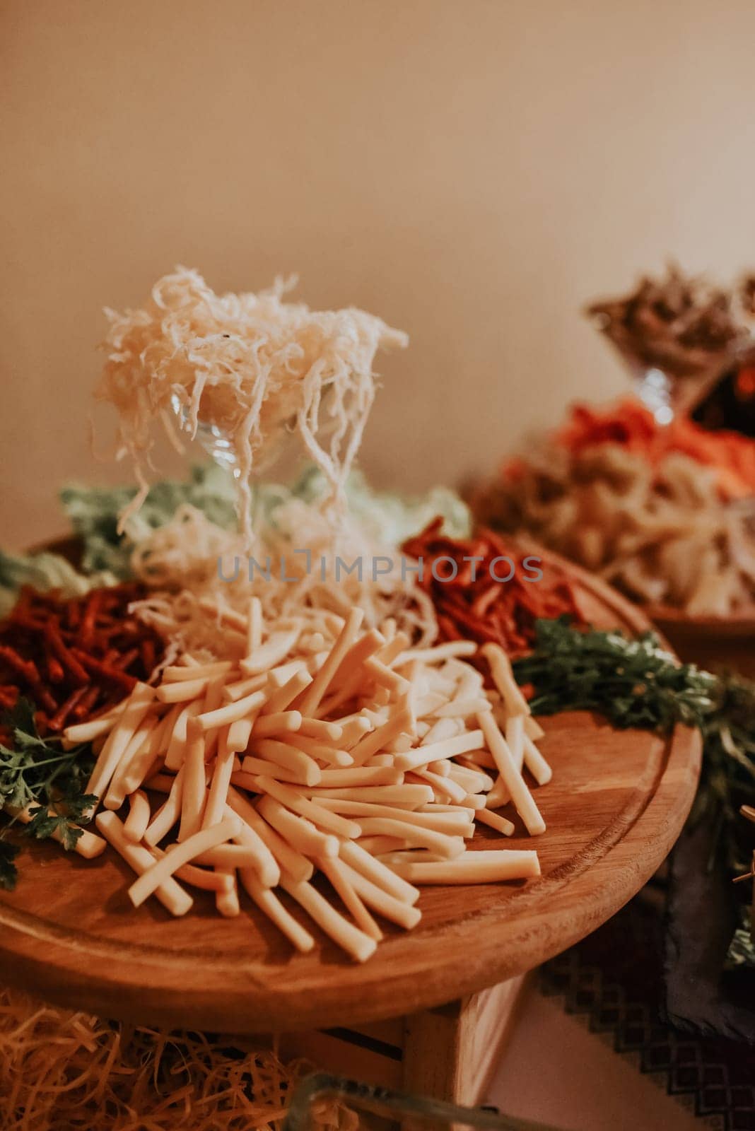 Cheese table. Delicious kinds of cheese. Buffet with cheese board. food snack party meat seafood Catering for party. Close up of sandwiches, appetizers and fruit. Canape. Christmas birthday or wedding