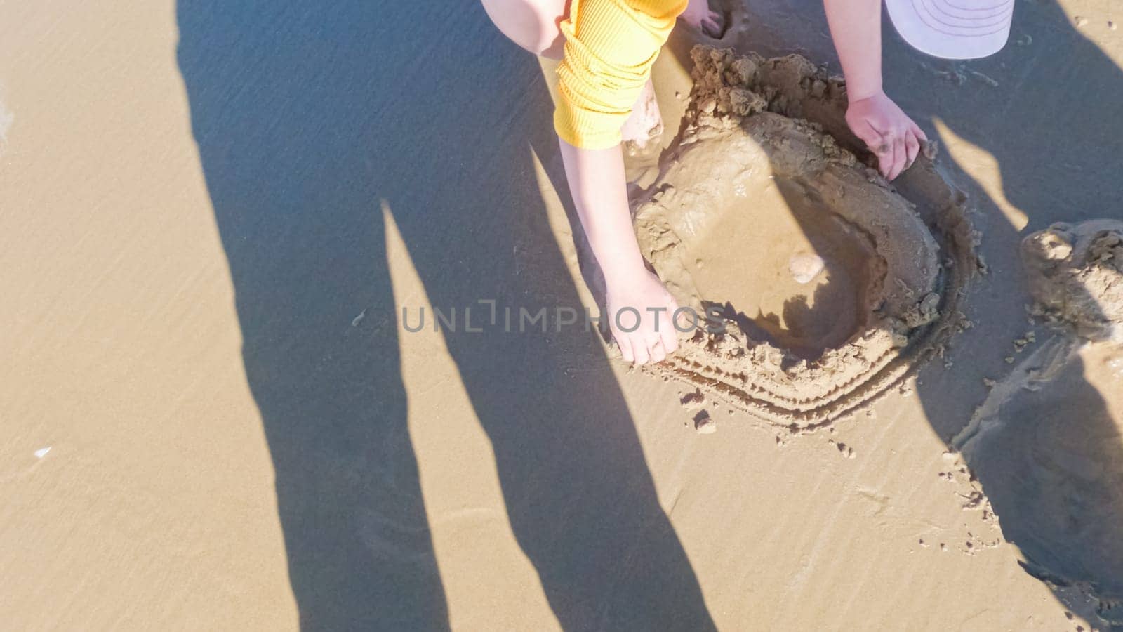 Little girl winter clamming at Pismo Beach by arinahabich