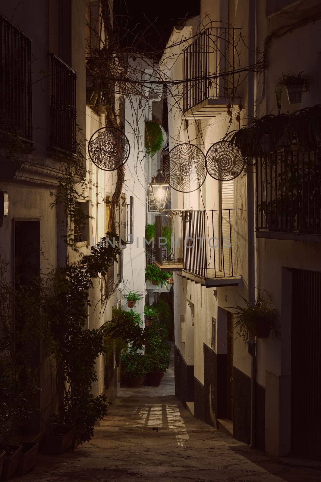 Calle Adentro at night. The most beautiful and famous street in the city of Quesada in the province of Jaen. by artgf