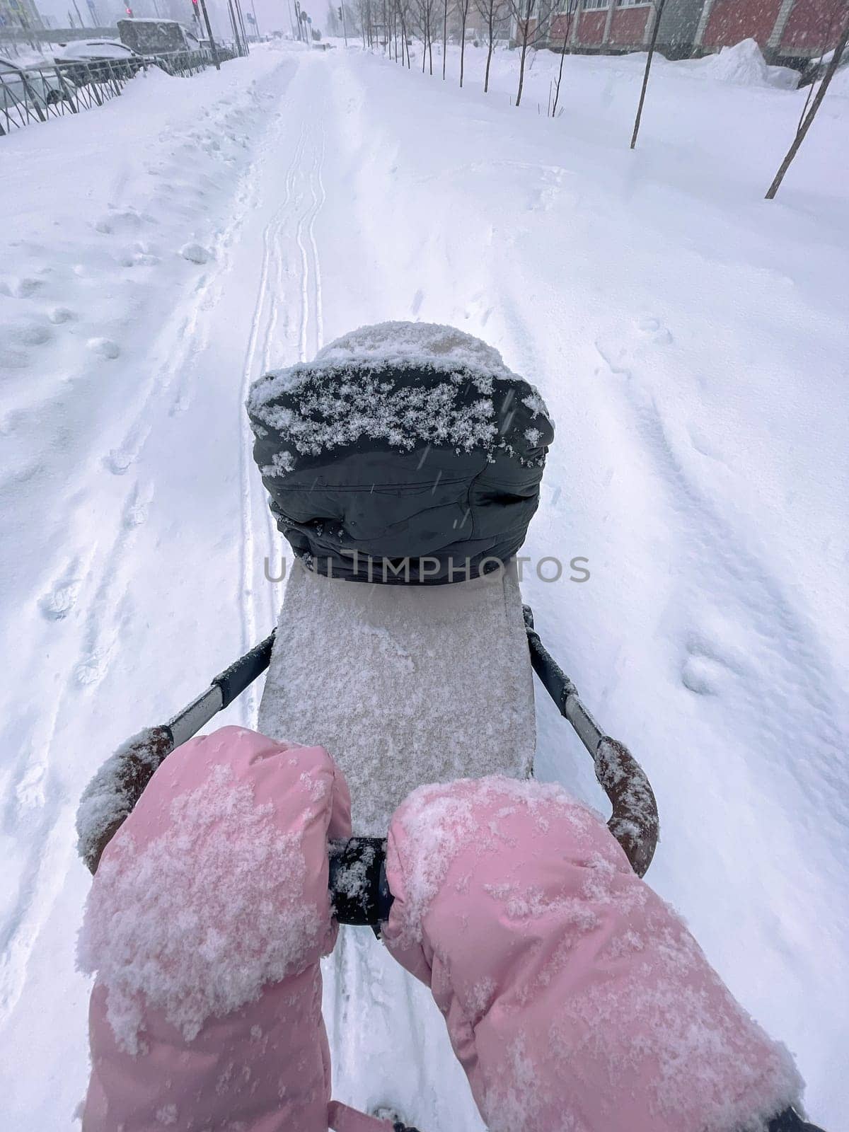 Wintry Walk: A Fathers Journey With Child in Snowy Silence. Vertical photo by darksoul72