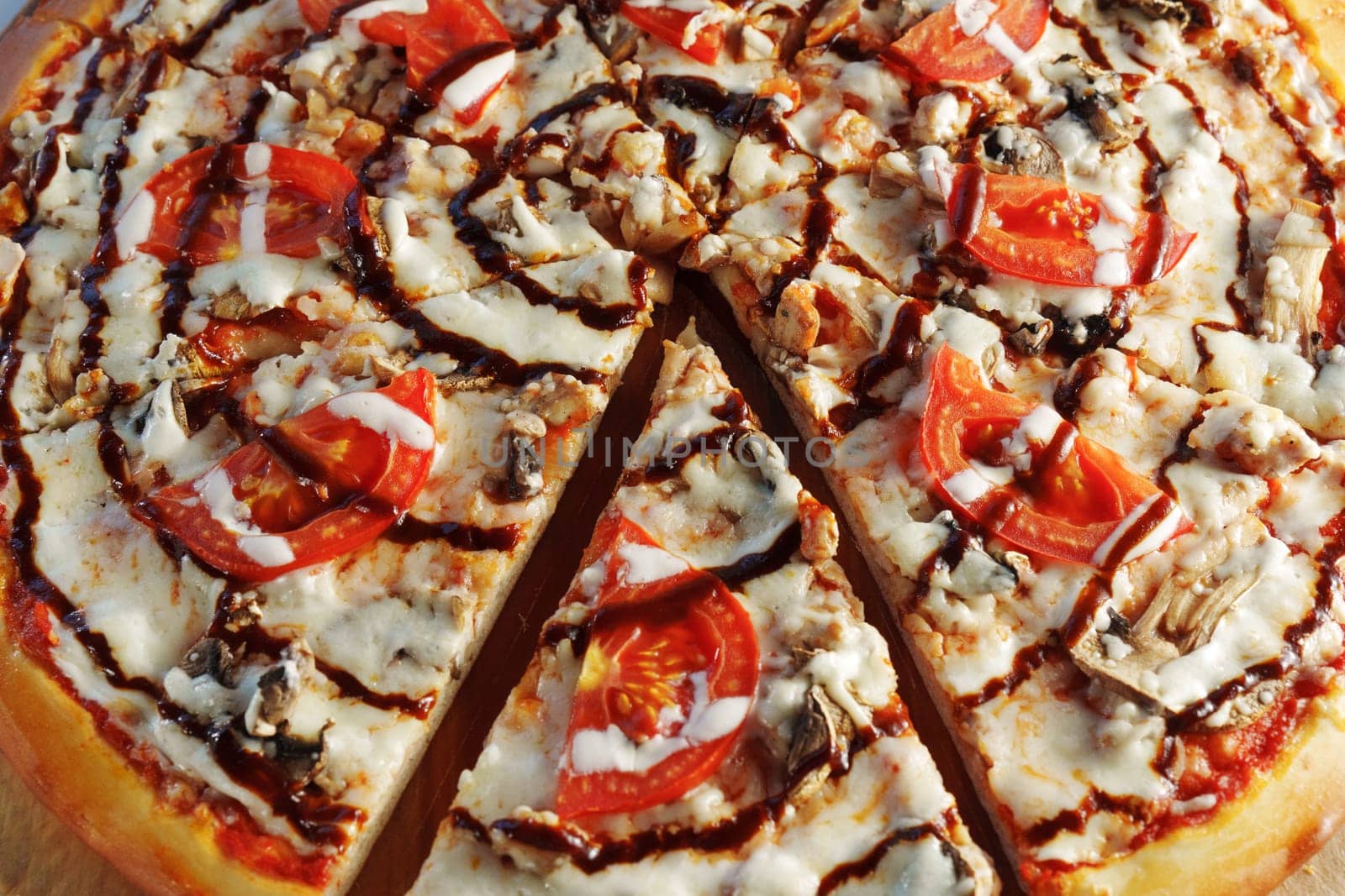 Gourmet Tomato and Mushroom Pizza Delight on Wooden Board
