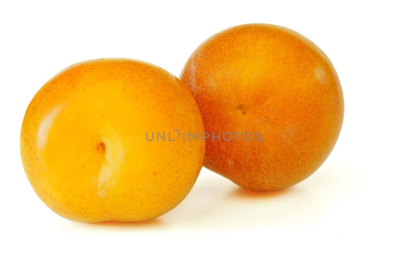 Yellow / orange greengage (Prunus domestica subsp. italica var. claudiana) fruits isolated on white background by Ivanko