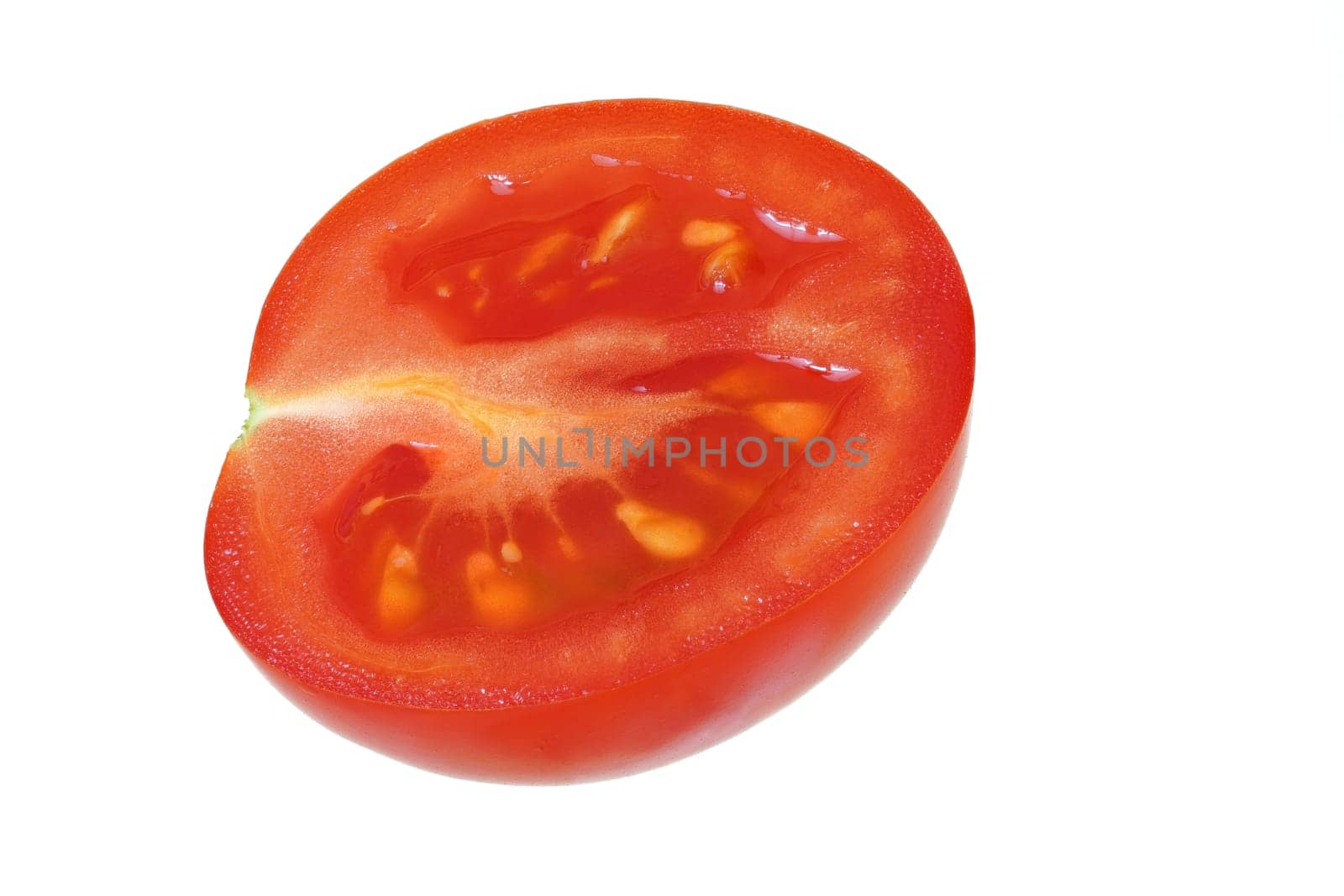 Small cherry tomato half isolated on white background