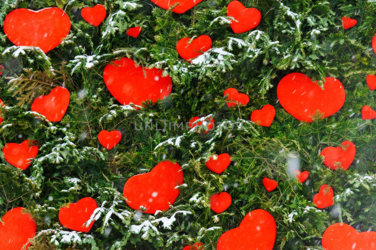 Vibrant red hearts are playfully scattered across the snowy landscape, creating a stunning contrast in colors and evoking a sense of warmth and joy.
