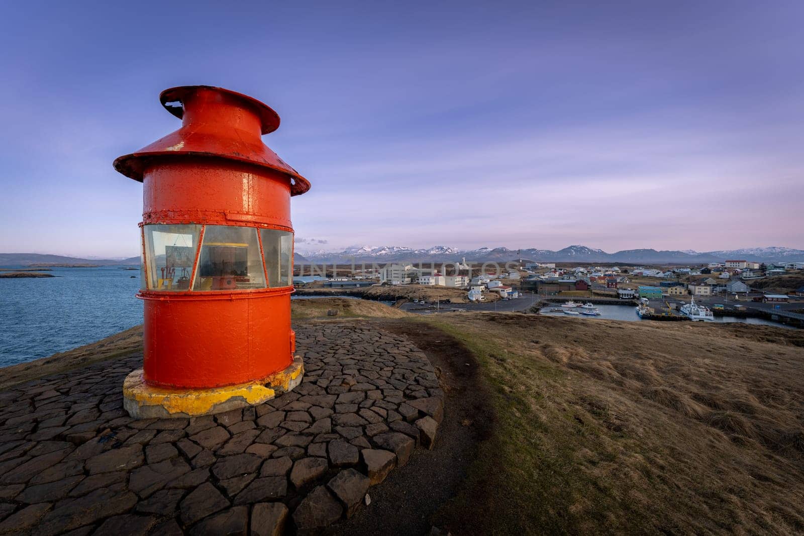 Stykkisholmur from Sugandisey red lighthouse at sunset, Iceland