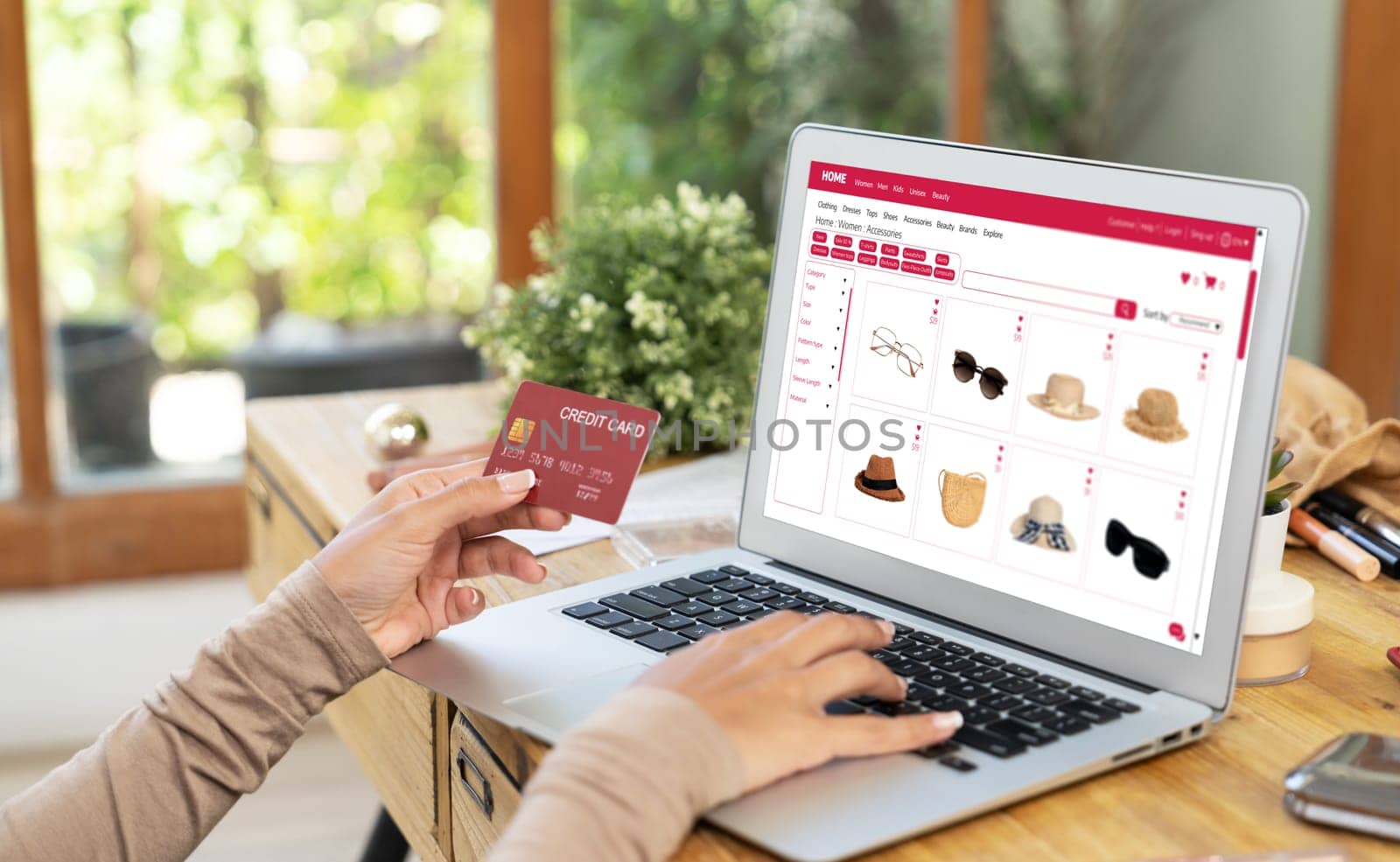 Woman shopping online on internet marketplace browsing for sale items for modern lifestyle and use credit card for online payment from wallet protected by crucial cyber security software