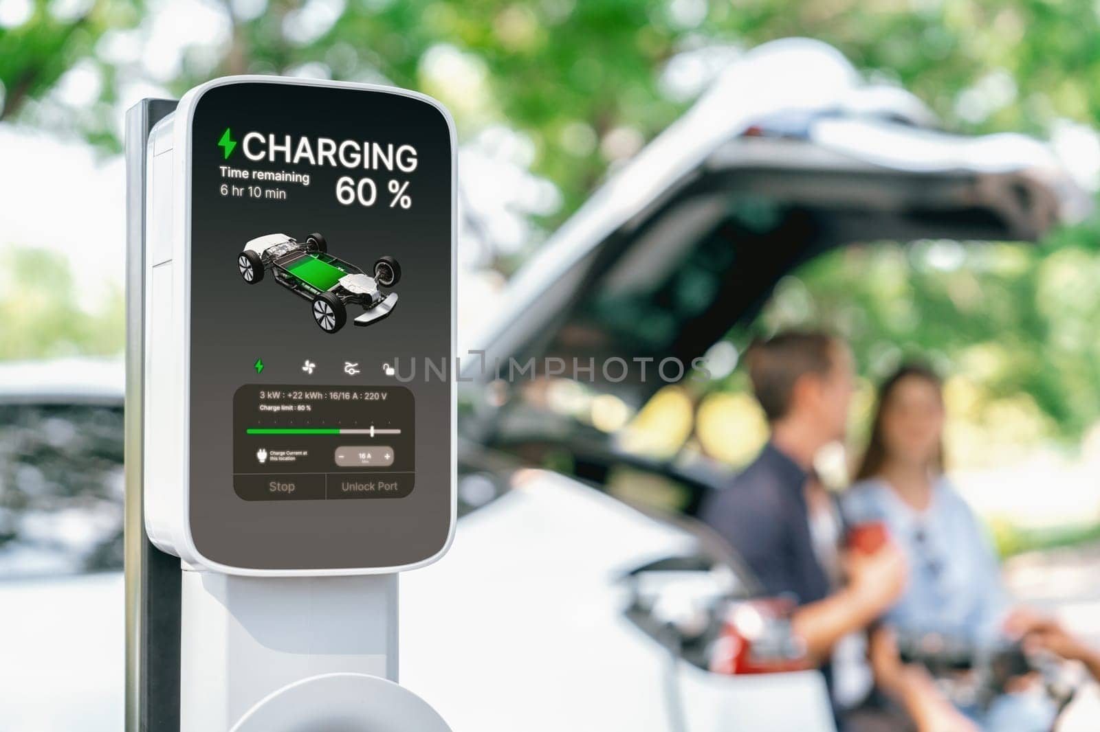 Focused EV charging station monitor display battery status for. Exalt by biancoblue
