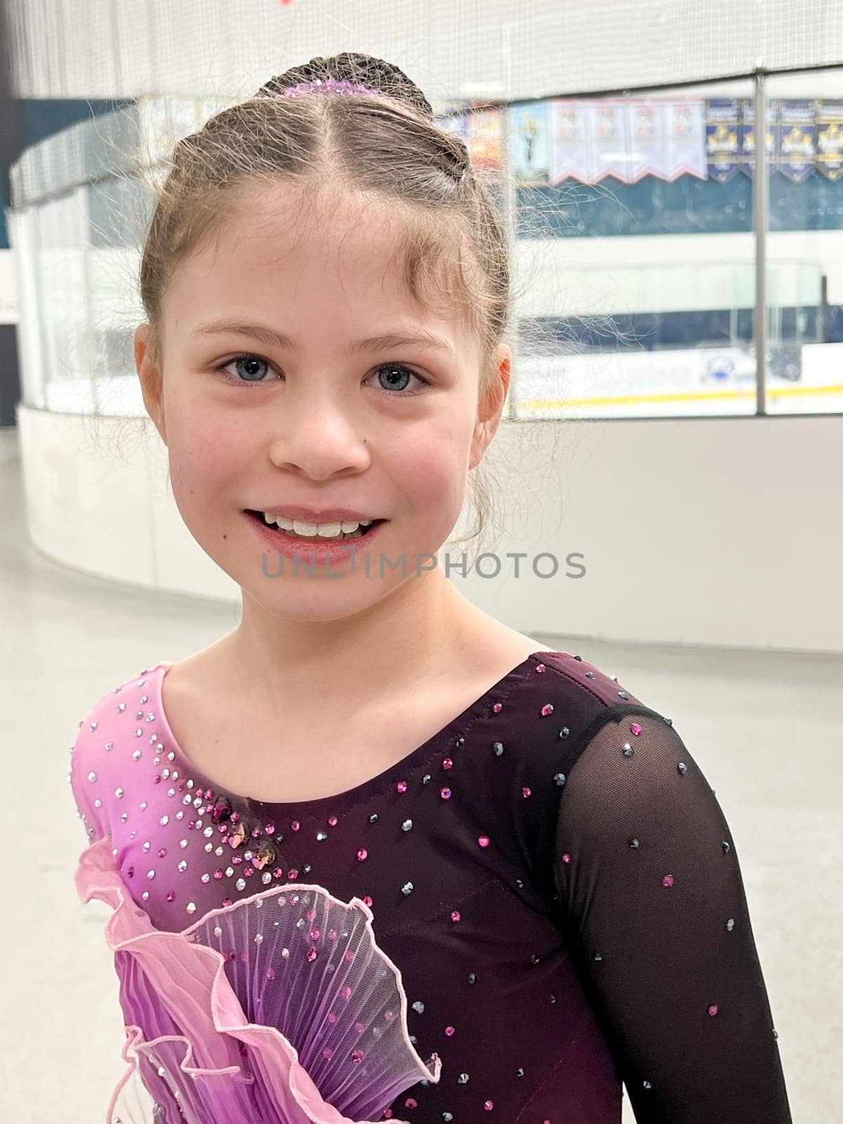 Young Figure Skater Ready for Competition in Sparkling Dress by arinahabich