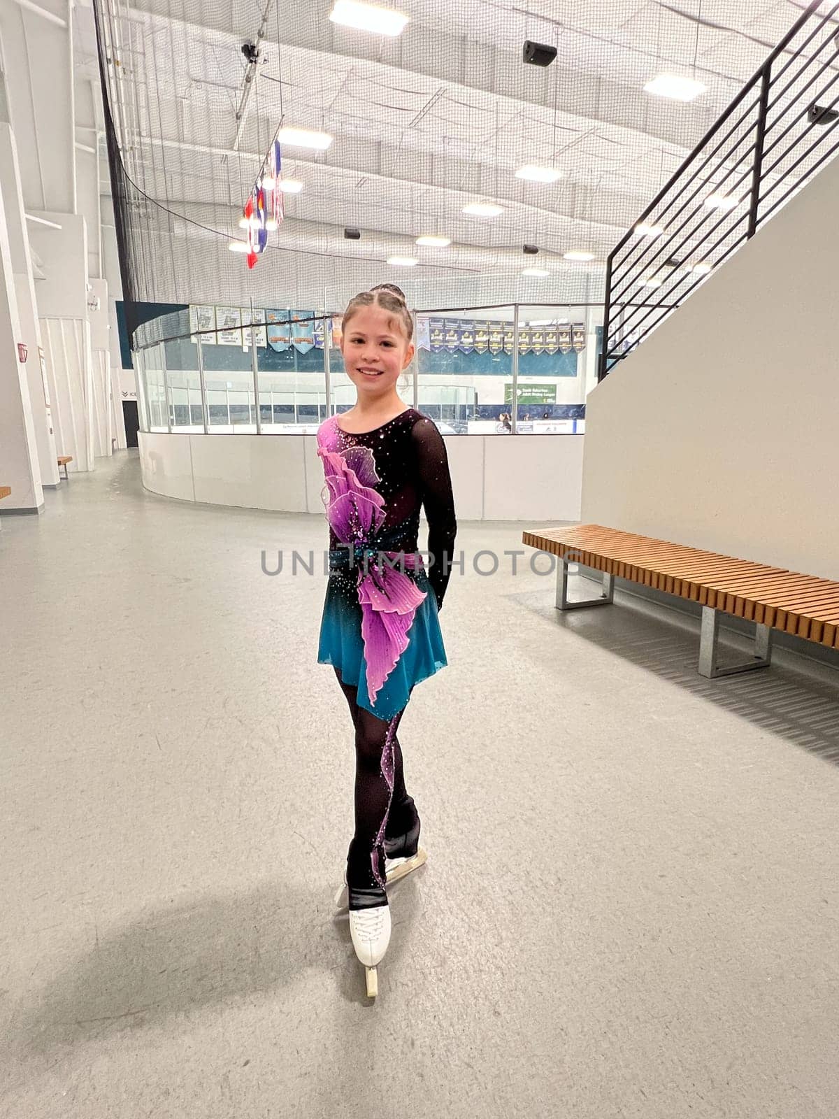 Young Figure Skater Ready for Competition in Sparkling Dress by arinahabich