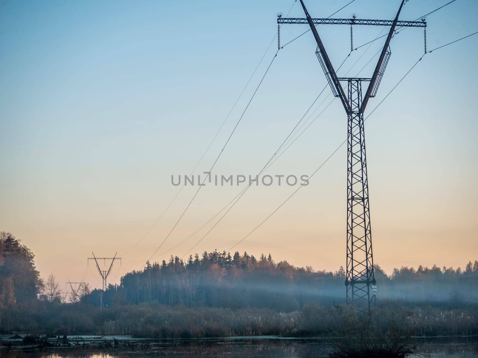 Rural landscape, the wires go into the mist. Russia, Moscow region. general plan by lempro