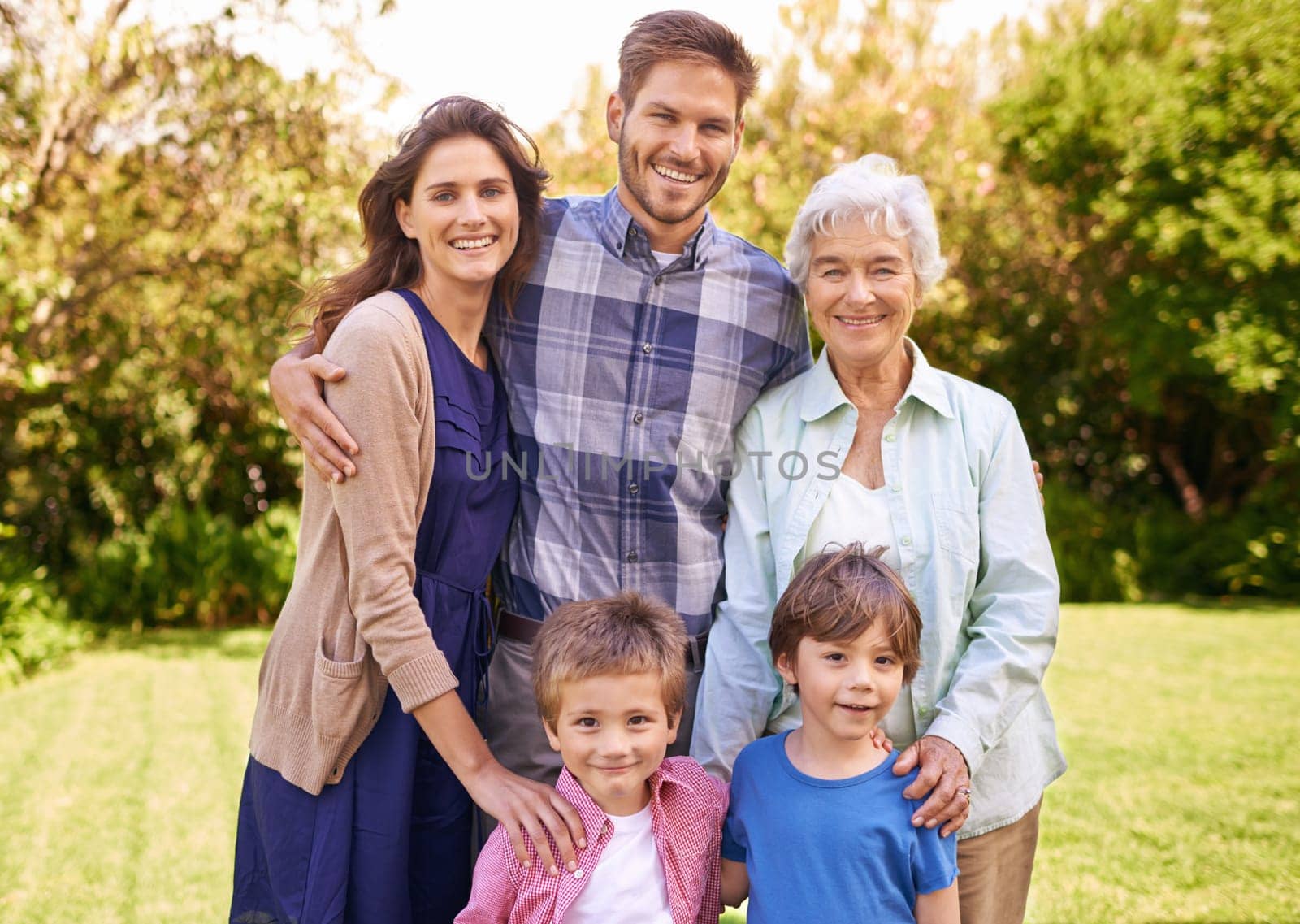 Family, outdoor and portrait for holiday, vacation and backyard with children and smile with love. Mom, dad and grandma with kids, nature and trees for memories, elderly and joy together in bonding.