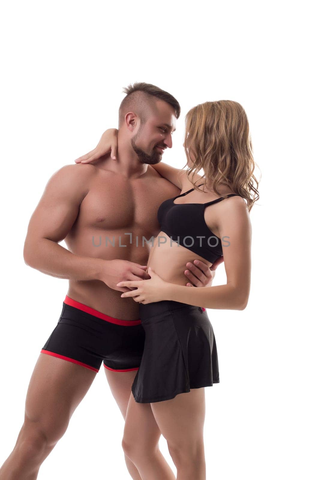 Studio photo of happy couple athletes. Healthy concept