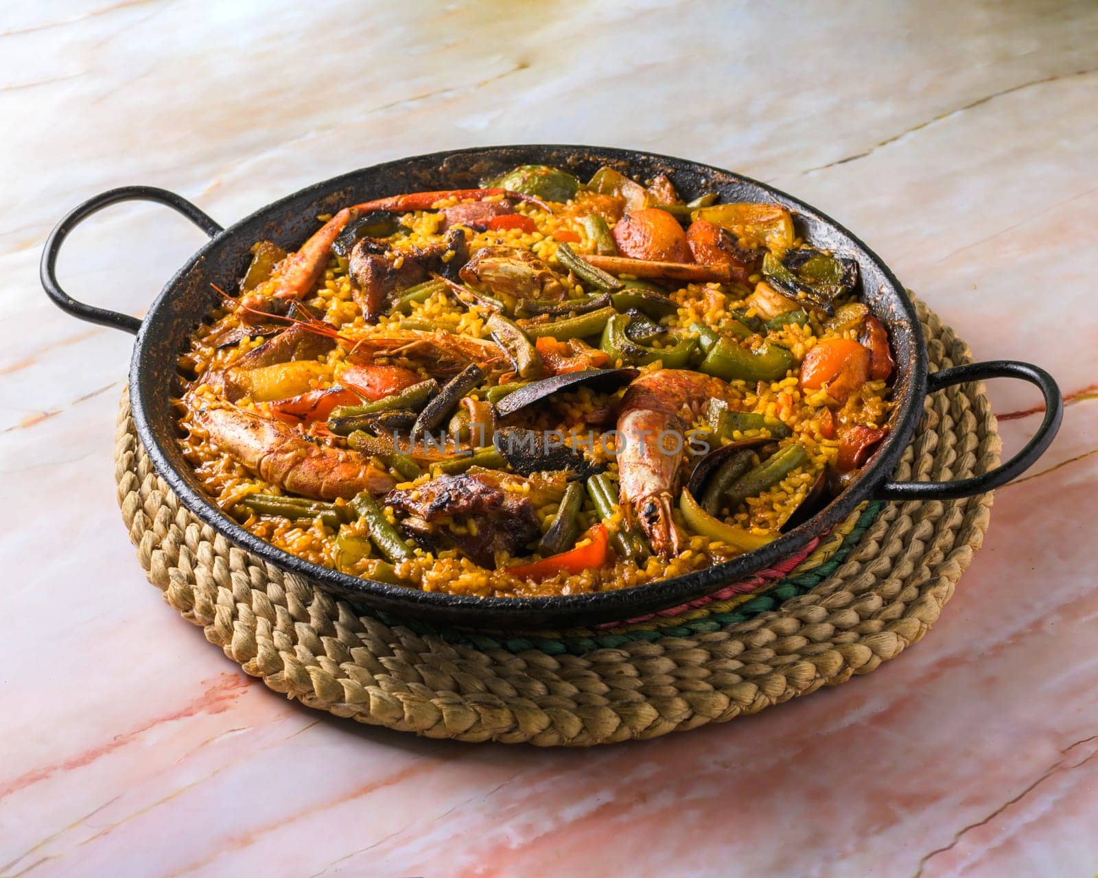 isolated view of paella mixta, typical spanish food,mediterranean gastronomic culture,