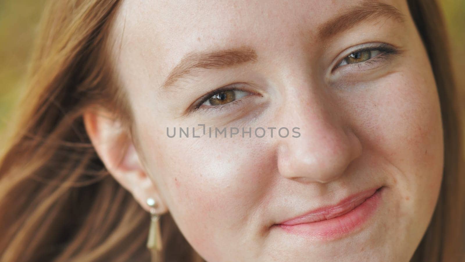 The face of a young 17-year-old girl. Close-up. by DovidPro