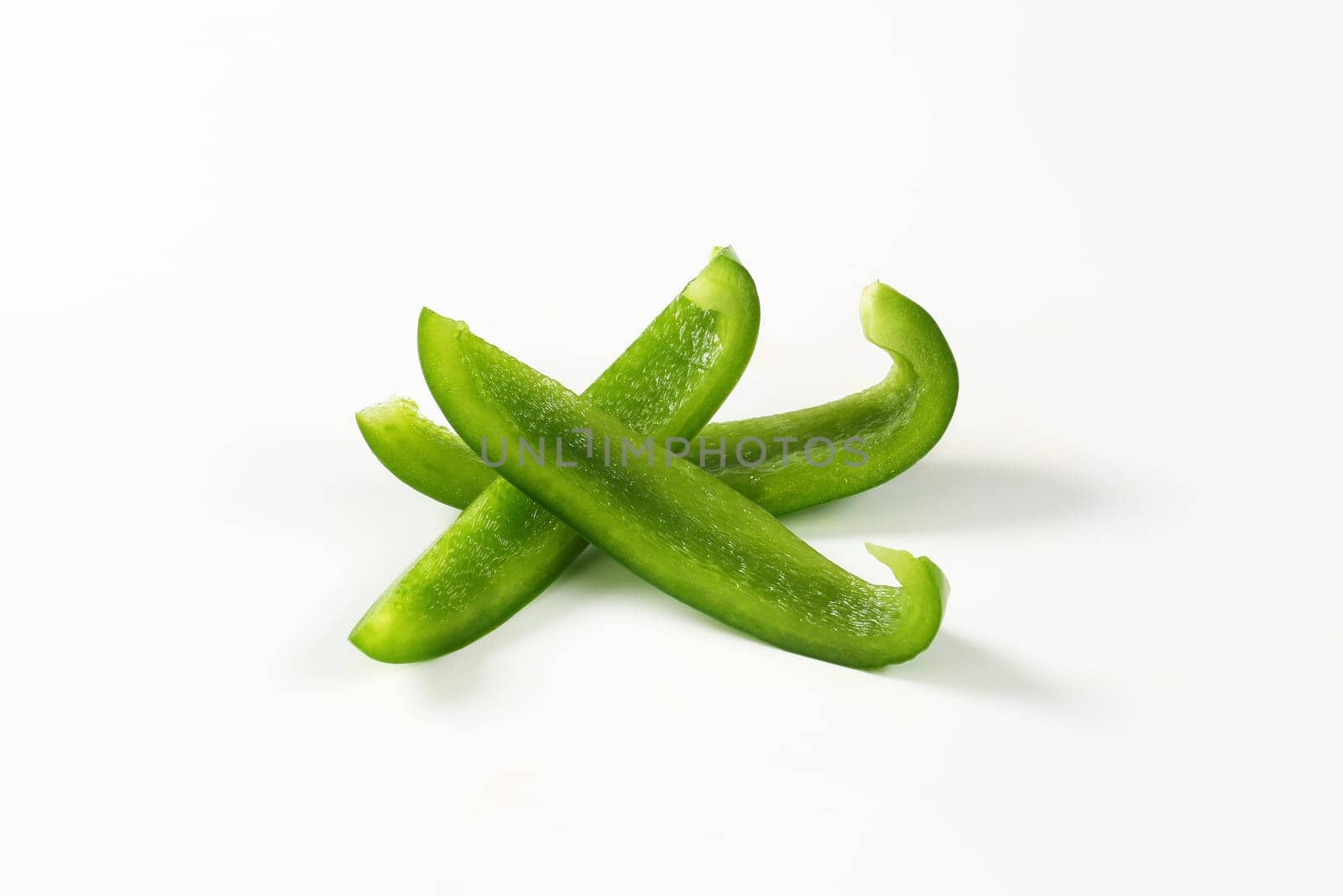 Green pepper slices by Digifoodstock