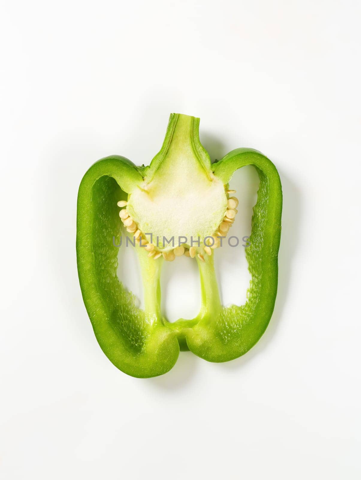 Thin slice of green bell pepper (cross section)