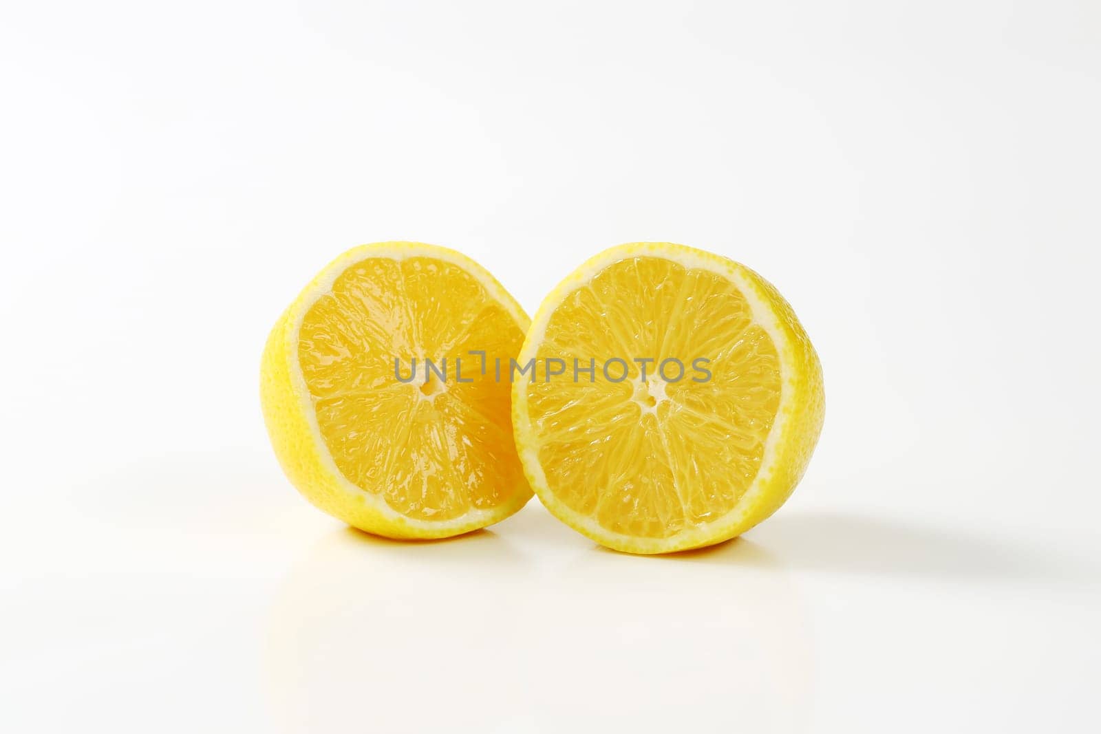 Fresh lemon cut into two halves