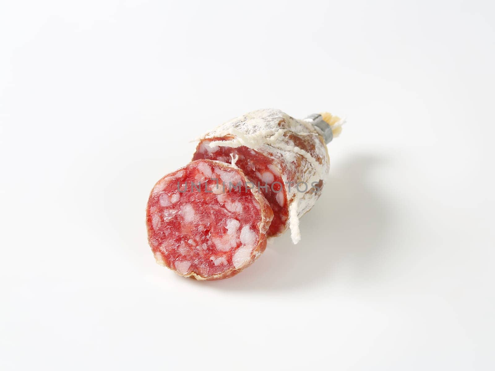 Piece of  dry cured French sausage