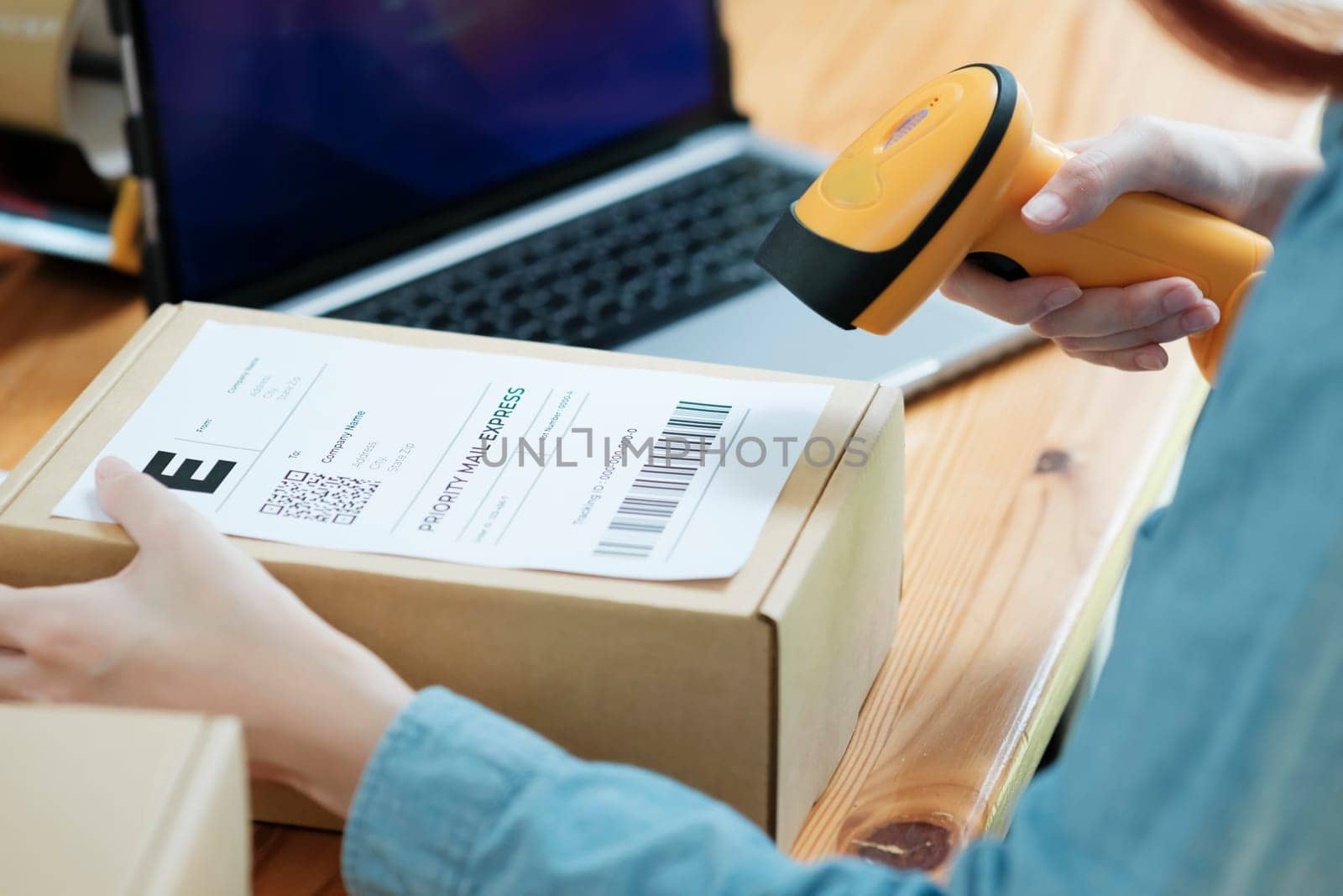 Scanning Barcode on Shipping Box with Scanner by ijeab