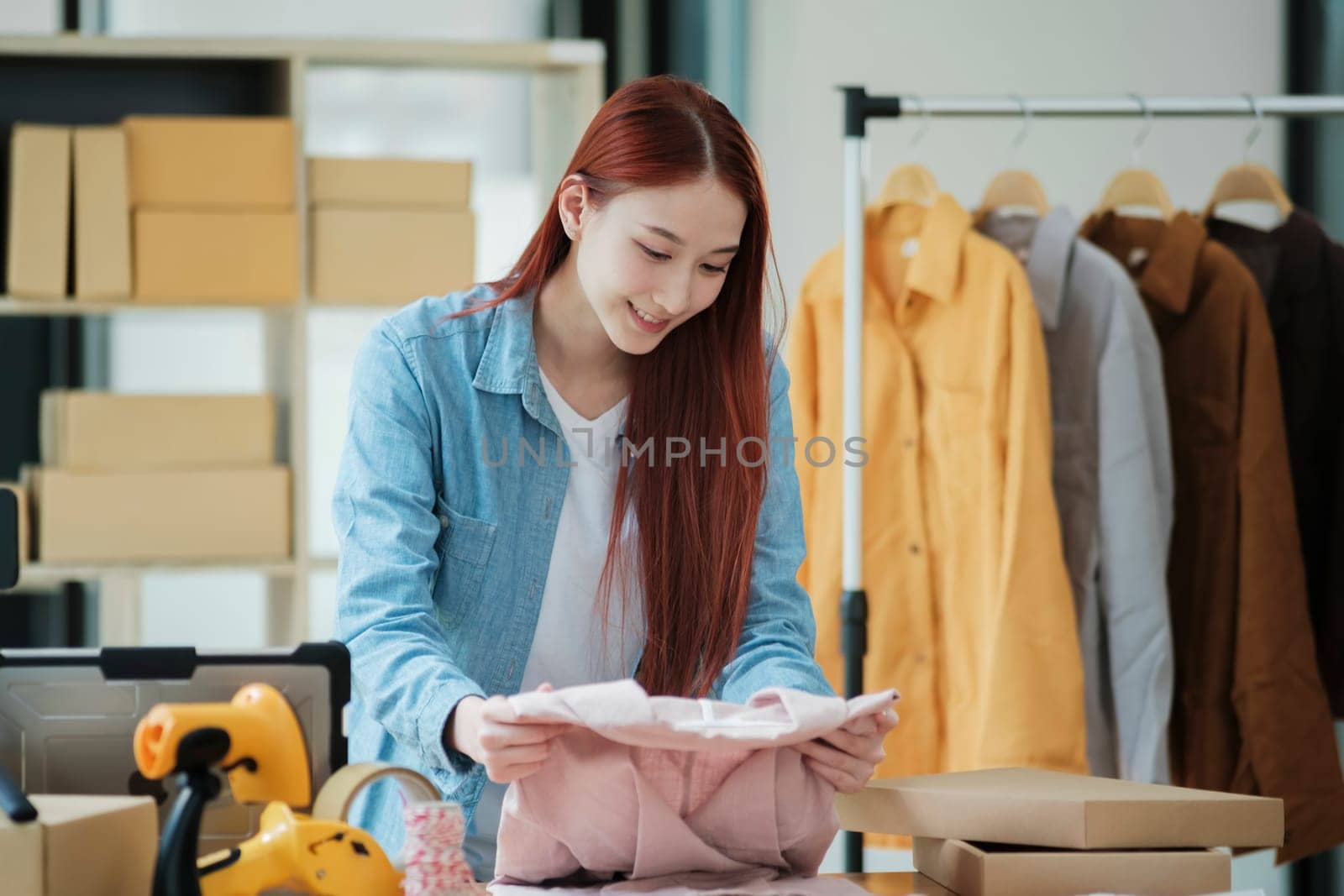 Small Business Owner Preparing Order for Shipment by ijeab