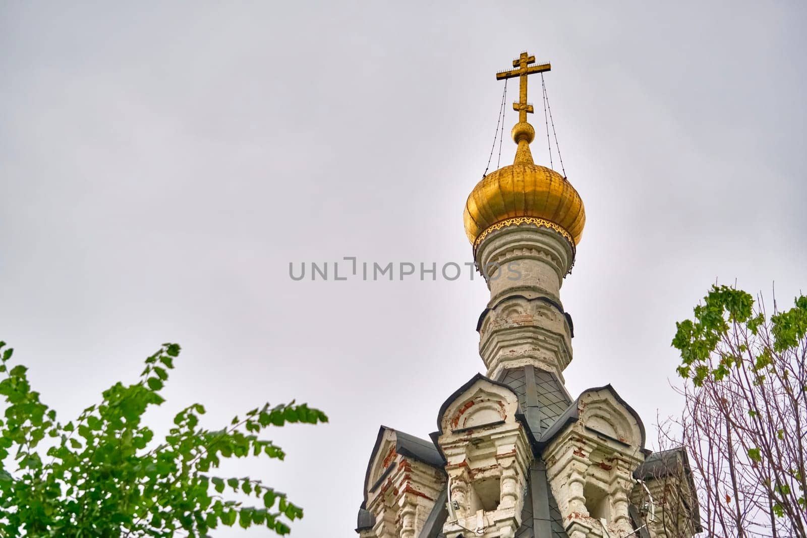 Russia-2020. Church domes of the Orthodox Church behind the trees. general plan. daylight color by lempro