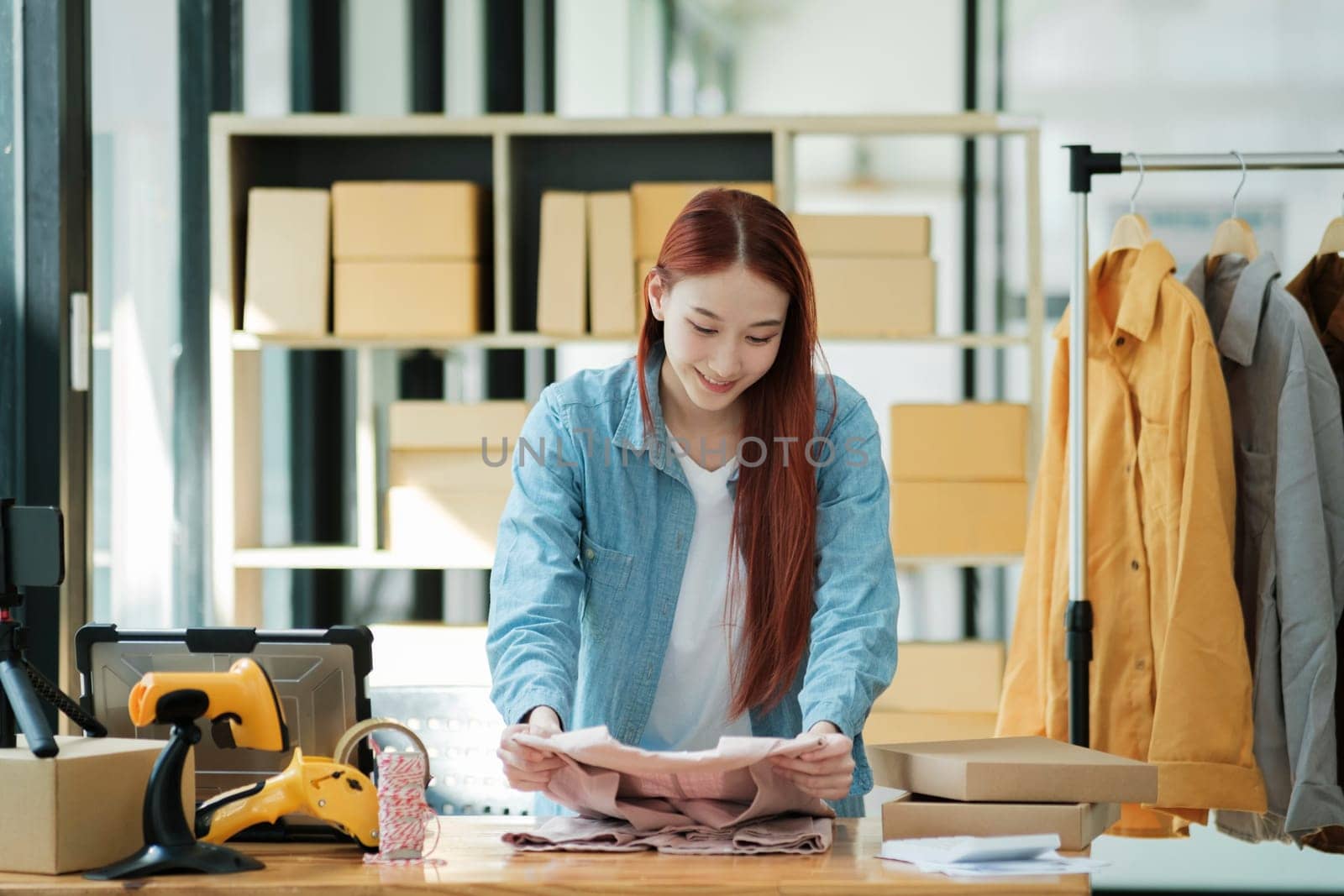 Small Business Owner Preparing Order for Shipment by ijeab