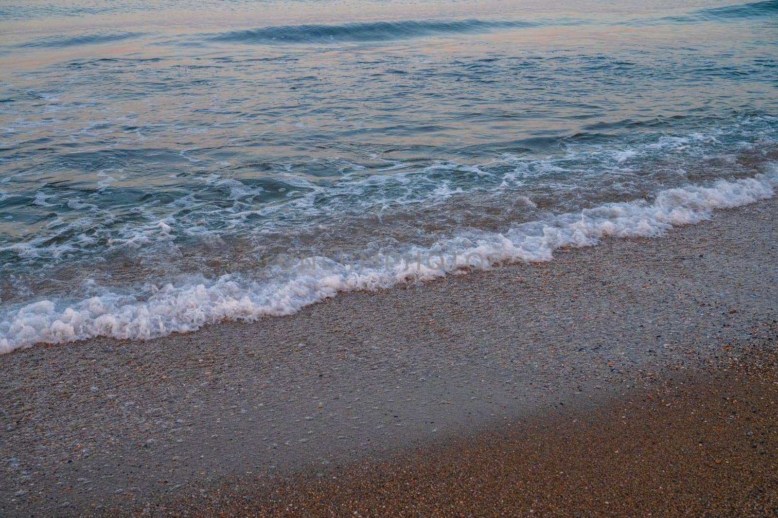 Beautiful sunrise scene on Alanya beach with view to famous Alanya island, in Turkey