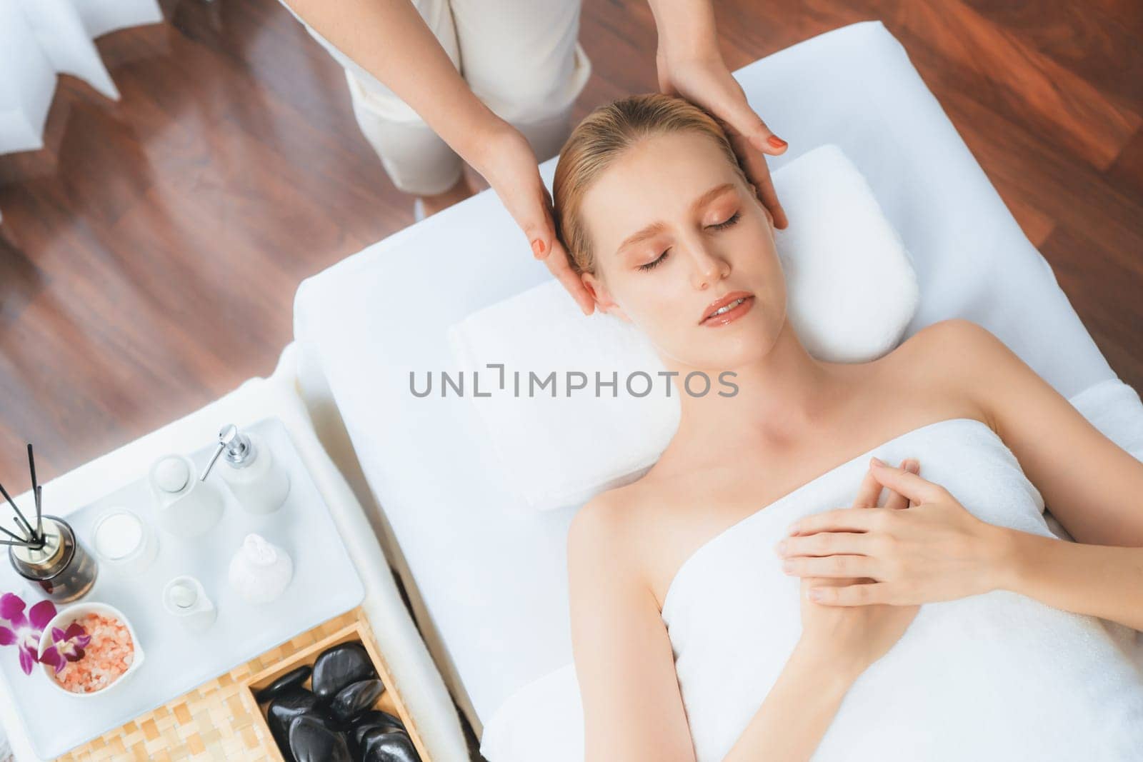 Panorama top view woman enjoying relaxing anti-stress head massage. Quiescent by biancoblue