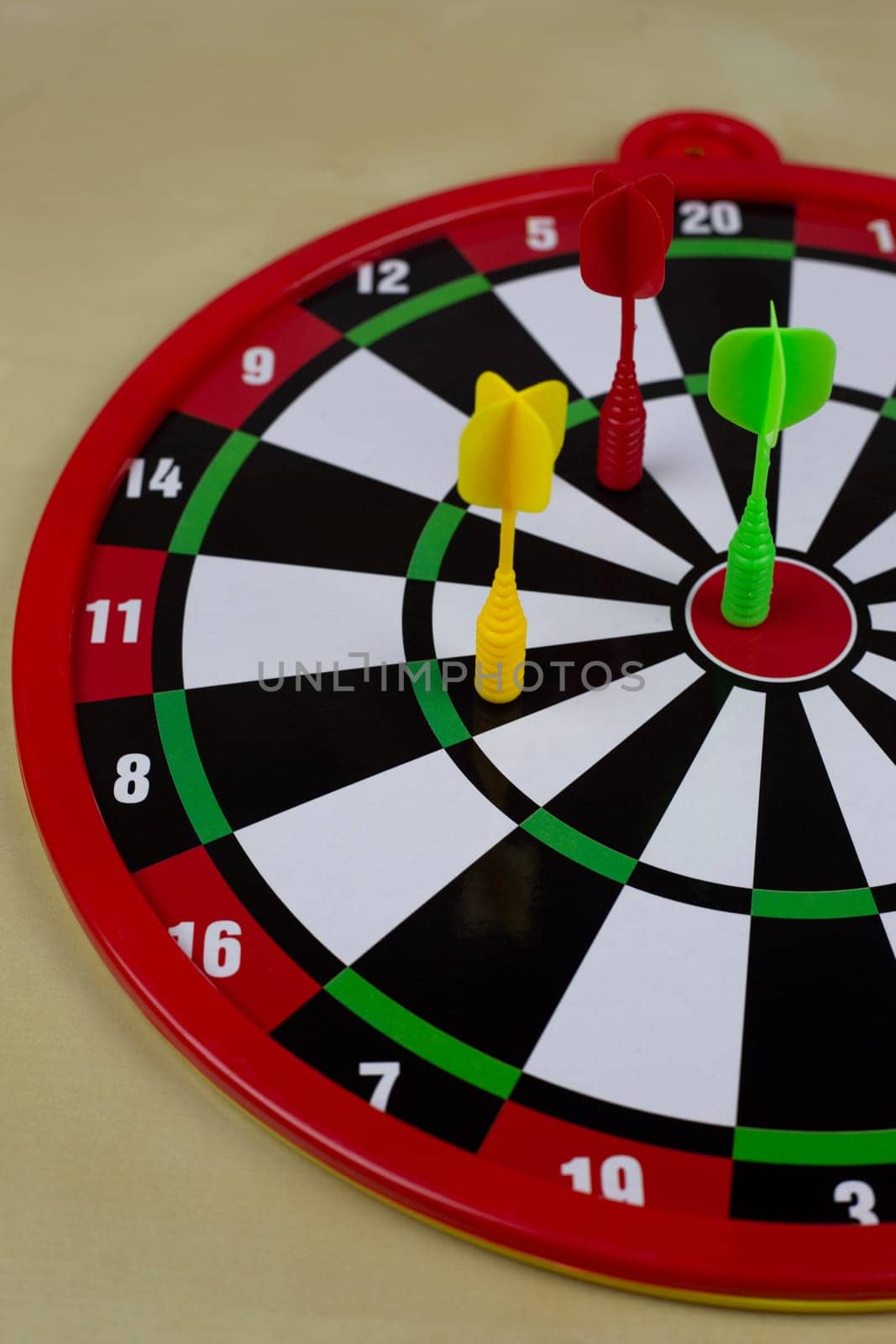 Multi colored darts with magnetic target for safe play for children