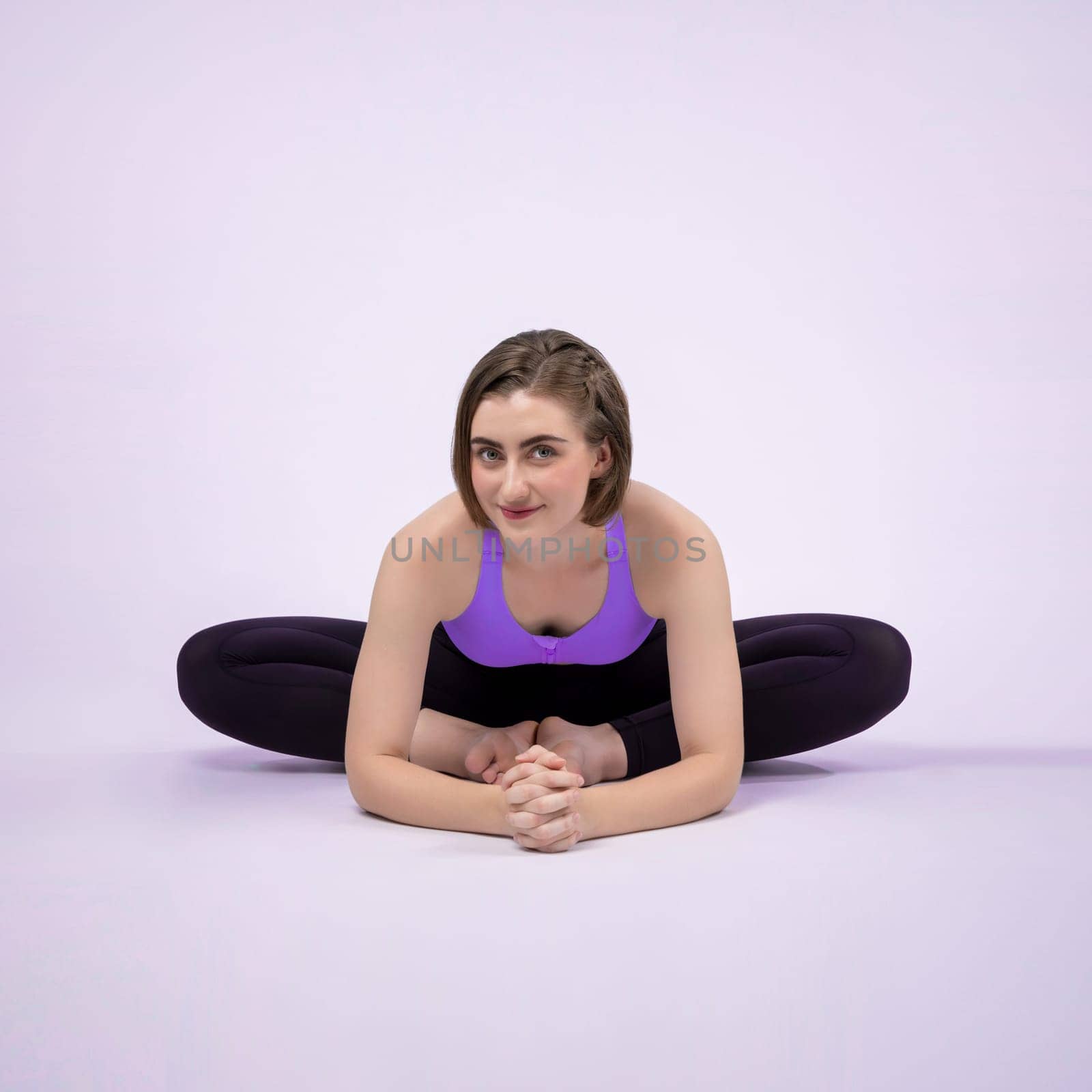 Full body length gaiety shot athletic and sporty woman doing healthy and meditative yoga exercise workout posture on isolated background. Healthy active and body care lifestyle