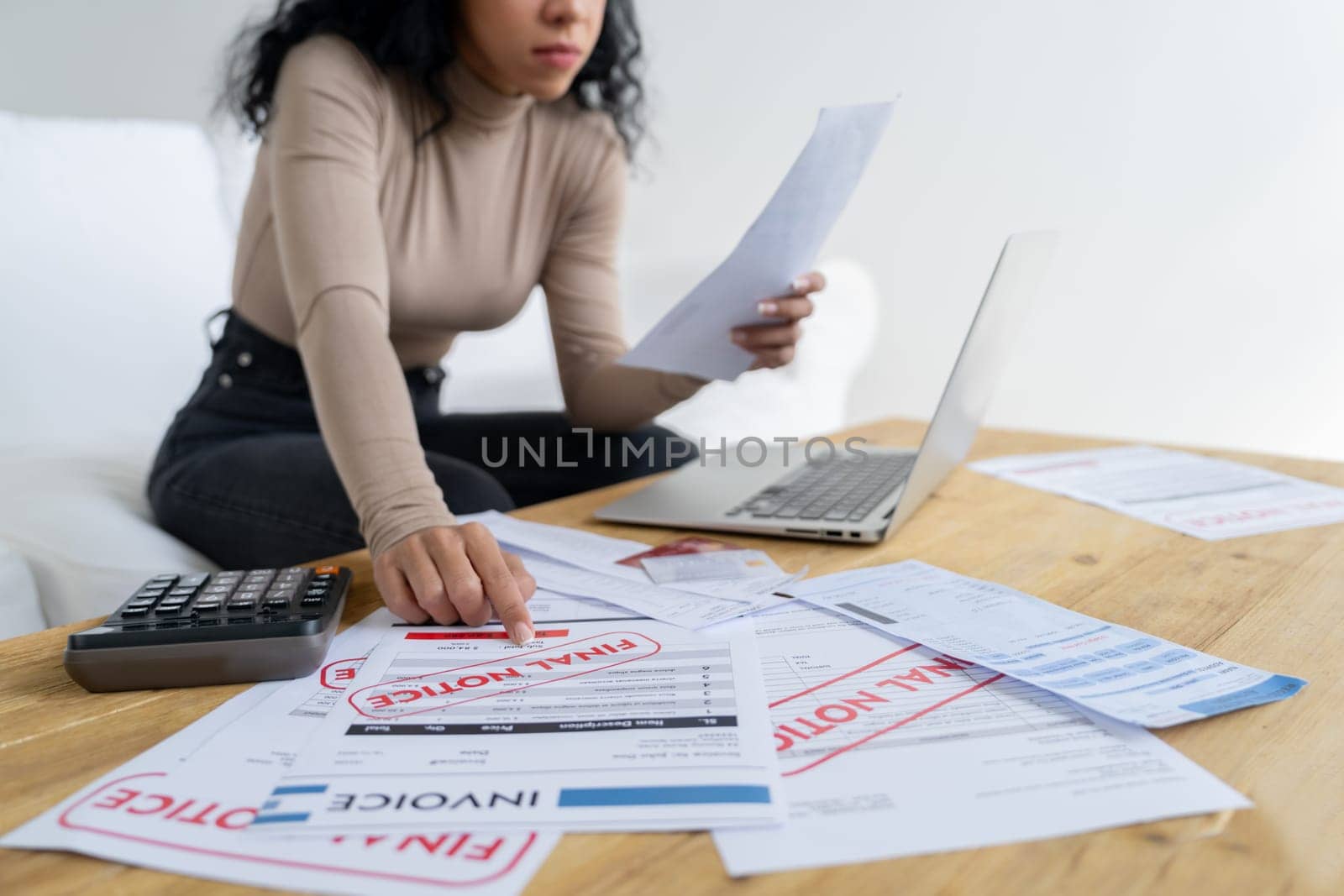 Stressed young woman has financial problems credit card debt to pay crucial by biancoblue