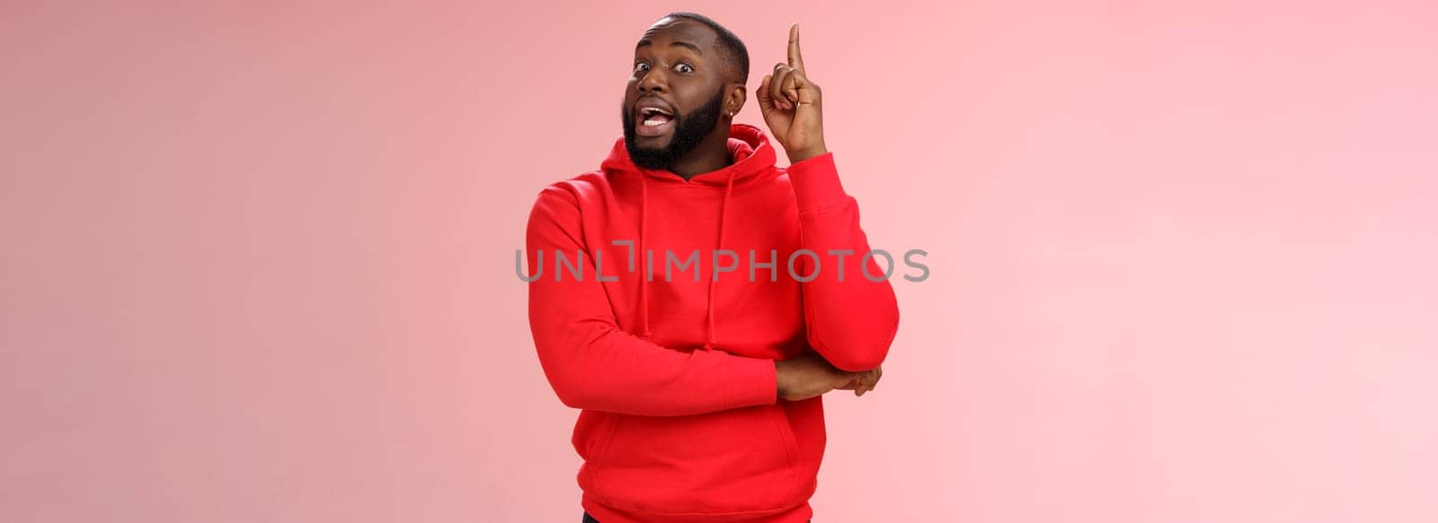 Got idea. Portrait excited african-american bearded guy inhale air have speech reise index finger eureka gesture wanna add word, have excellent plan sharing thoughts, standing pink background by Benzoix