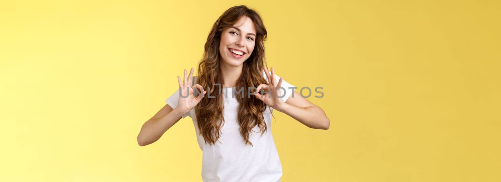 Fine choice have my approval. Satisfied cheerful good-looking european woman long chestnut haircut show okay ok satisfactory gesture tilt head amused smiling broadly agree like good job by Benzoix