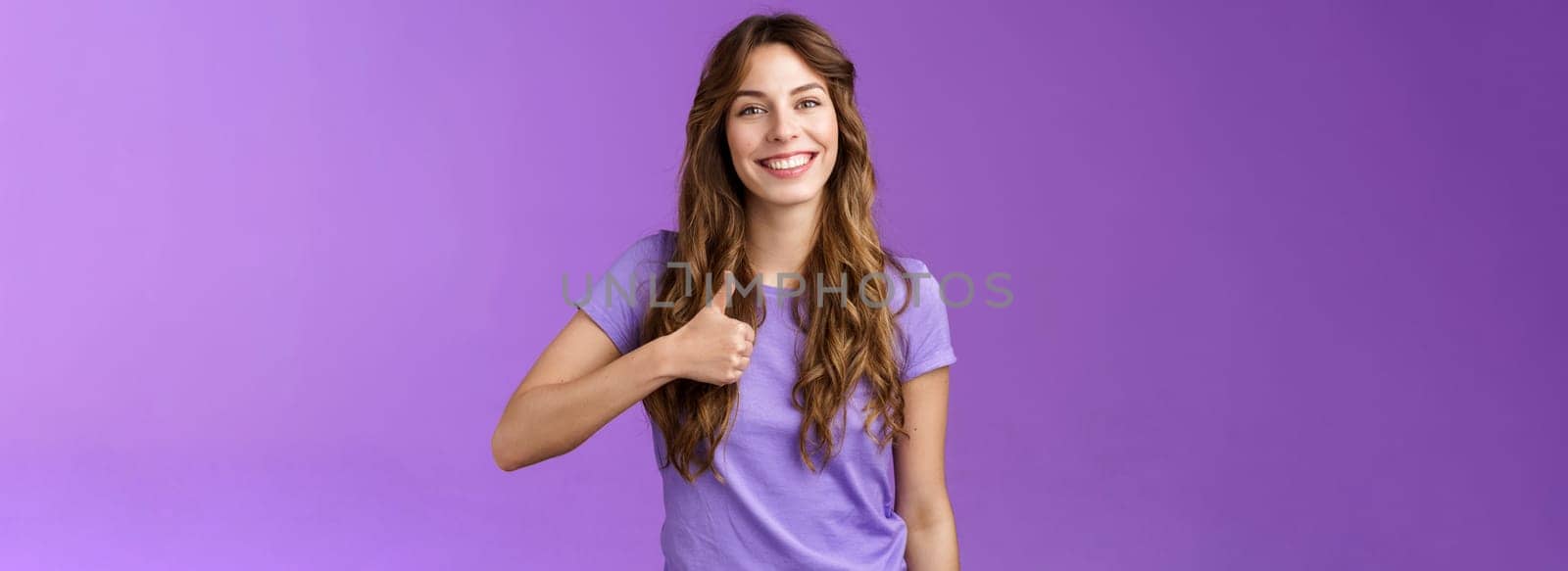 Supportive girl give friend positive reply thumb up sign smiling broadly satisfied good choice grinning approving awesome plan agree terms like your outfit positive opinion purple background by Benzoix