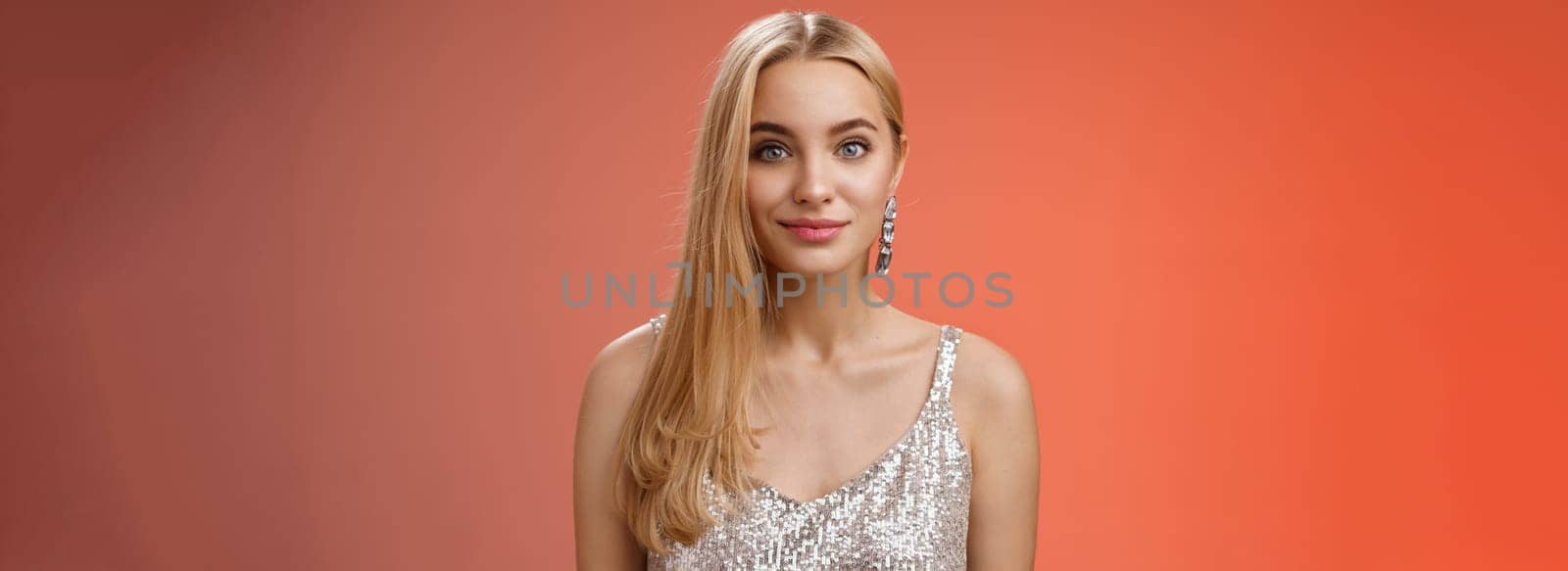 Lifestyle. Waist-up friendly charming elegant blond girl long hairstyle in silver stylish dress smiling amused listening story chatting boyfriend eating-out romantic date have interesting conversation.