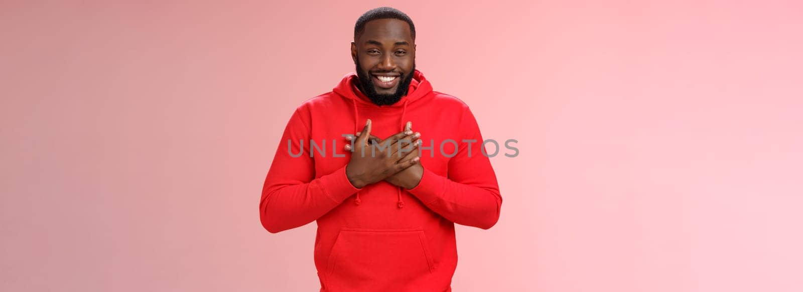Guy cherish friendship. Portrait lovely touched pleased cute african american bearded man receive touching compliments press palms heart happy grateful, feel thankful appreciating nice gestures.