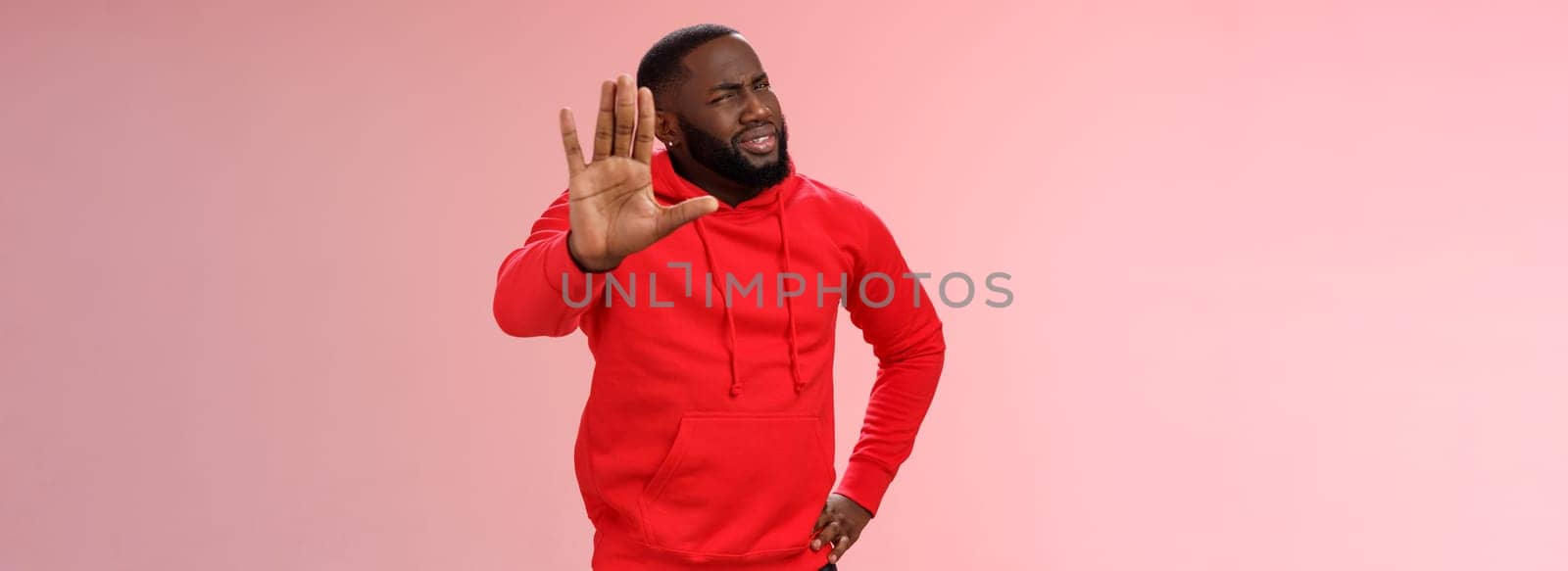 Hold on, stop right there. Portrait confused perplexed african american man cringing questioned raise hand enough shut up gesture arguing hear stupid nonsense, standing pink background by Benzoix