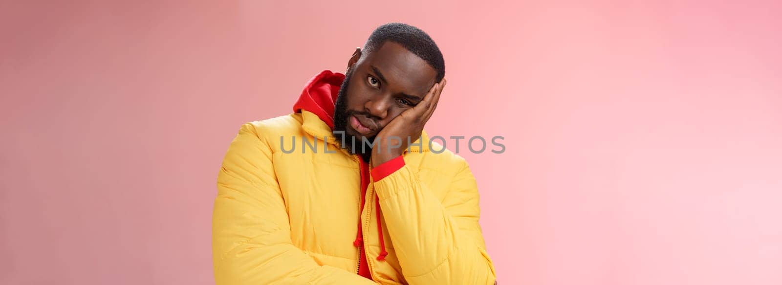 Annoyed bothered pissed african-american bearded man in yellow jacket facepalm look angry camera irritated lean head hand bored fed up pissed hearing uninteresting same stories, pink background.