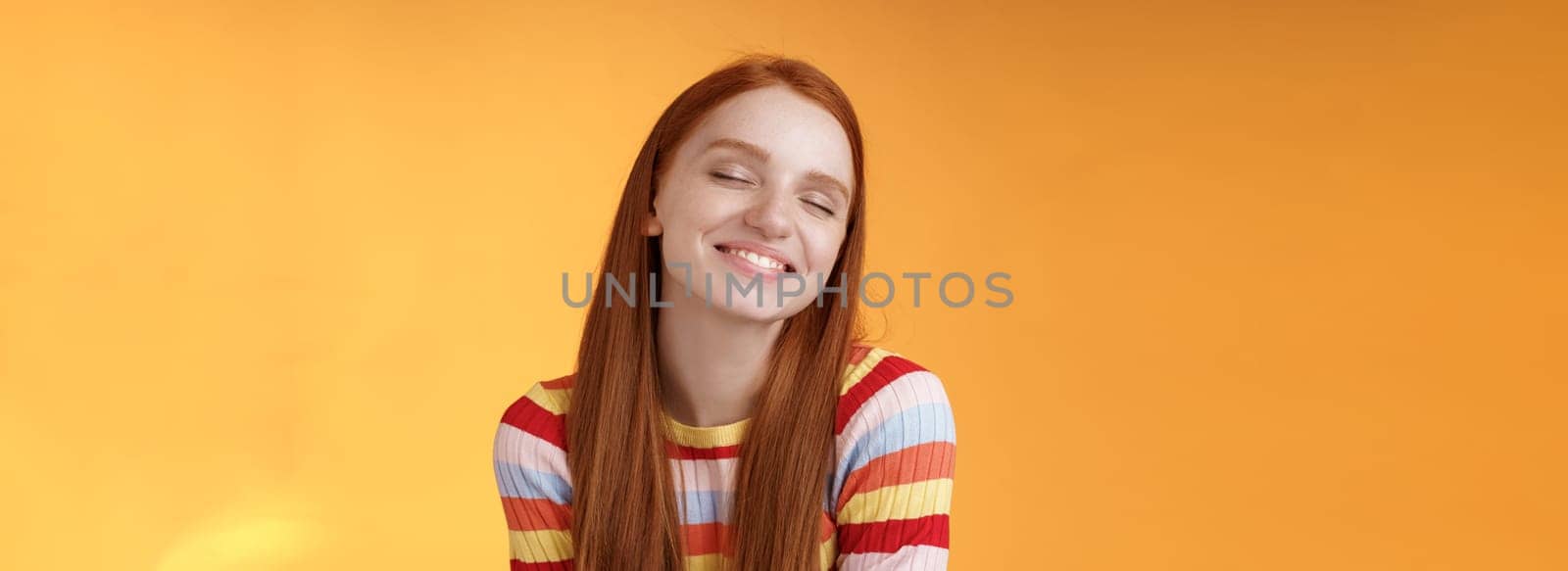 Tender sensual dreamy cute redhead feminine girl dreaming about tasty slice pizza close eyes smiling delighted drooling standing fascinated mesmerized recalling lovely moment, orange background by Benzoix