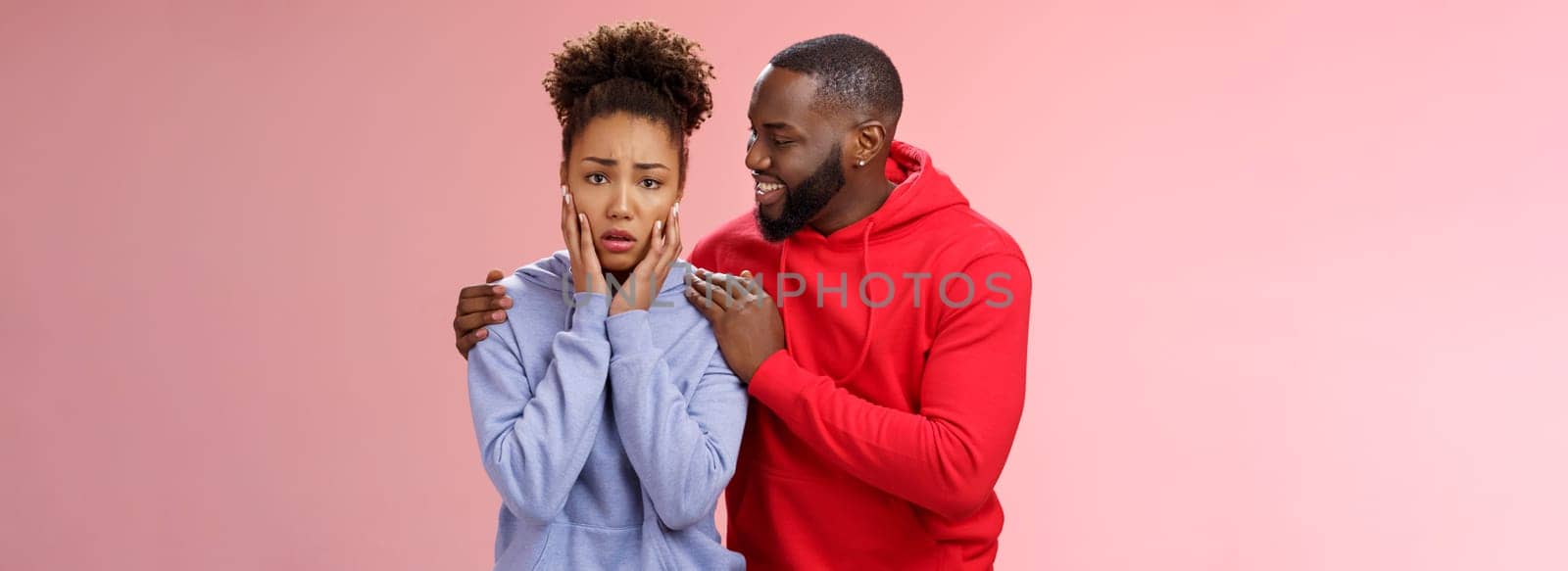 Boyfriend comforting worried nervous girlfriend attend dentist frowning touching face anxiously panicking man hugging girl touch shoulders smiling encourage, look supportive assuring all okay by Benzoix