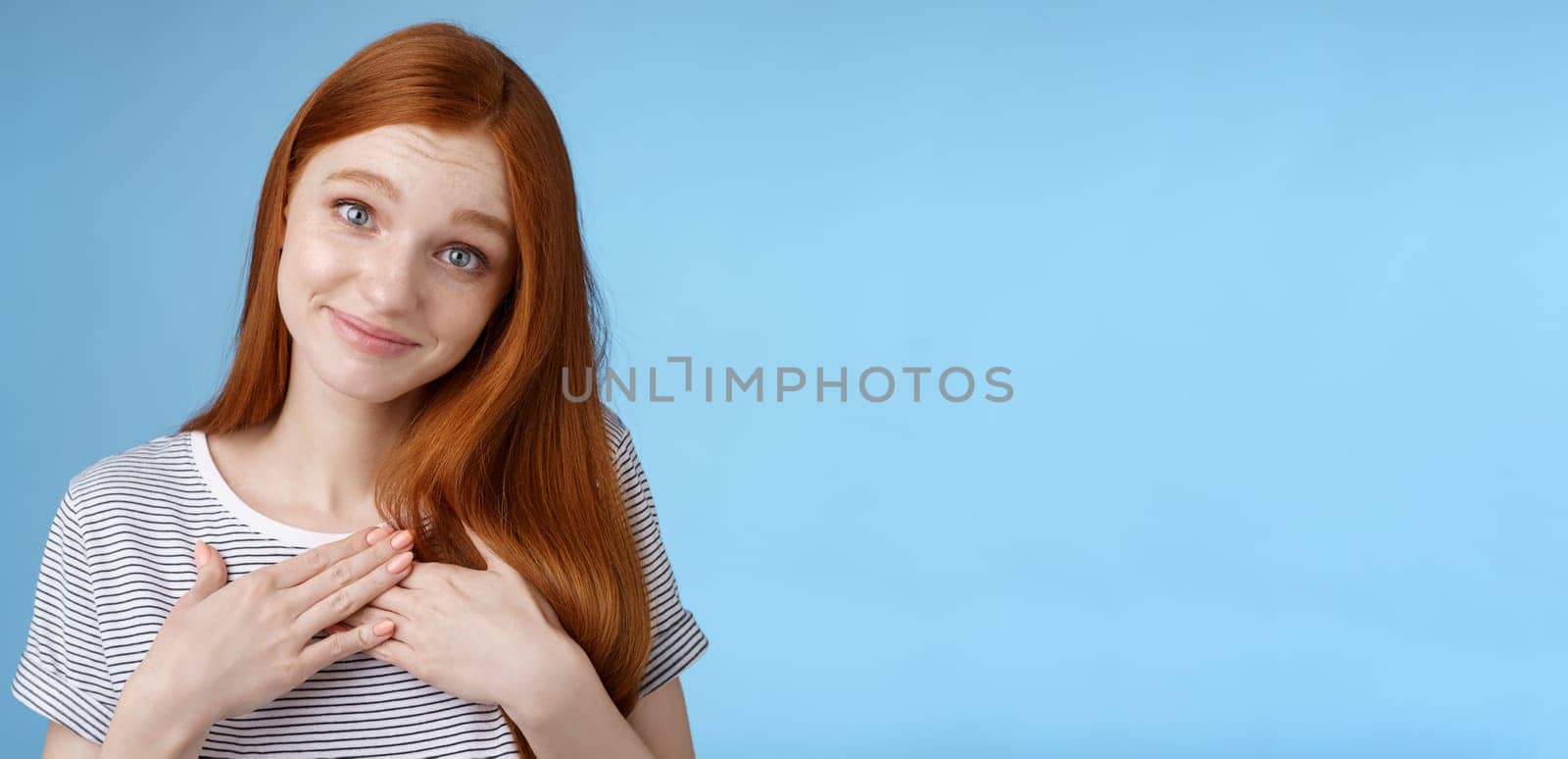 Kind tender sincere cute caucasian redhead girl melting go speechless heartwarming precious moment touched moving gift received compliment smiling delighted press palms grateful, thankful.