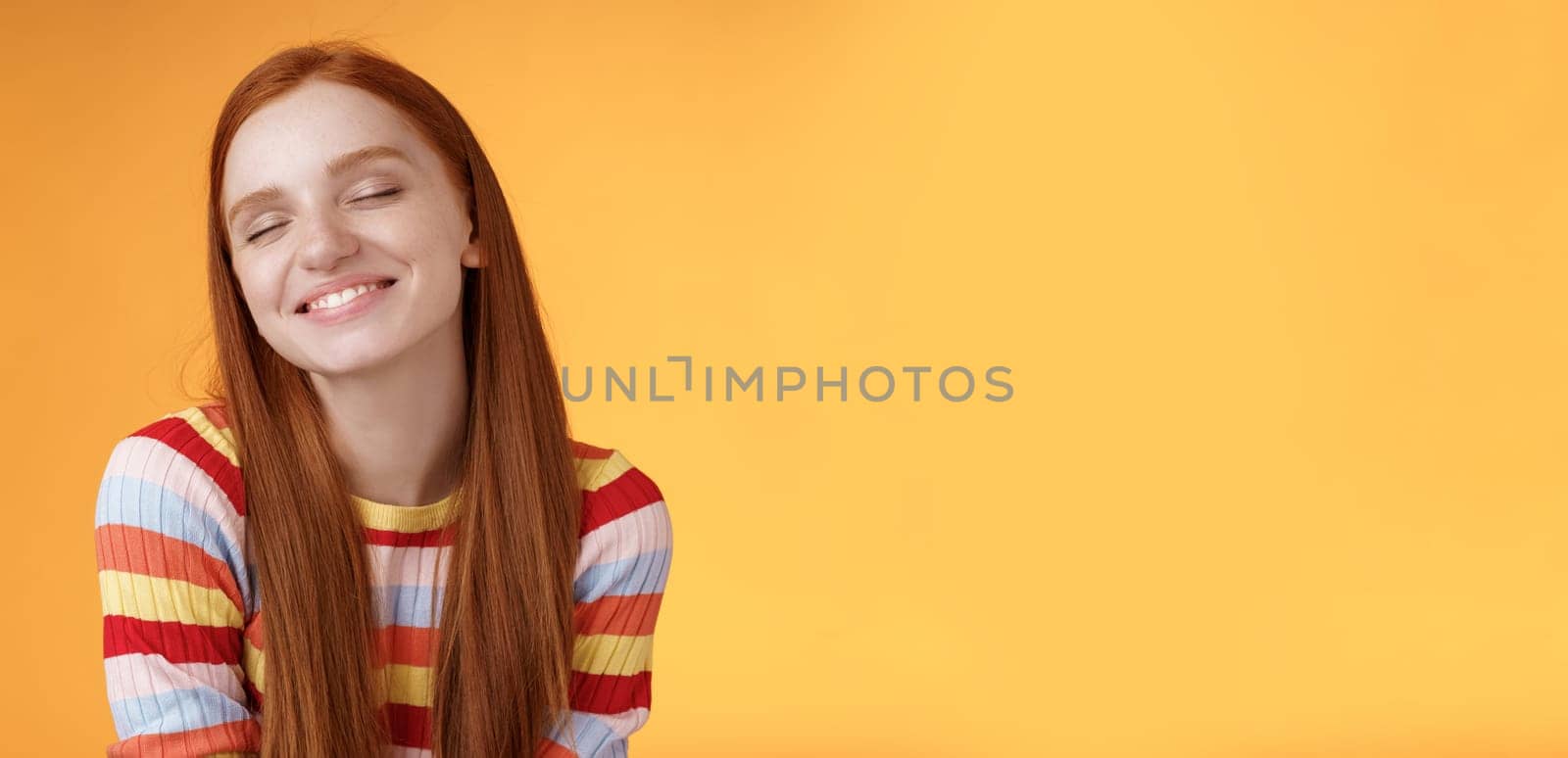 Tender sensual dreamy cute redhead feminine girl dreaming about tasty slice pizza close eyes smiling delighted drooling standing fascinated mesmerized recalling lovely moment, orange background by Benzoix