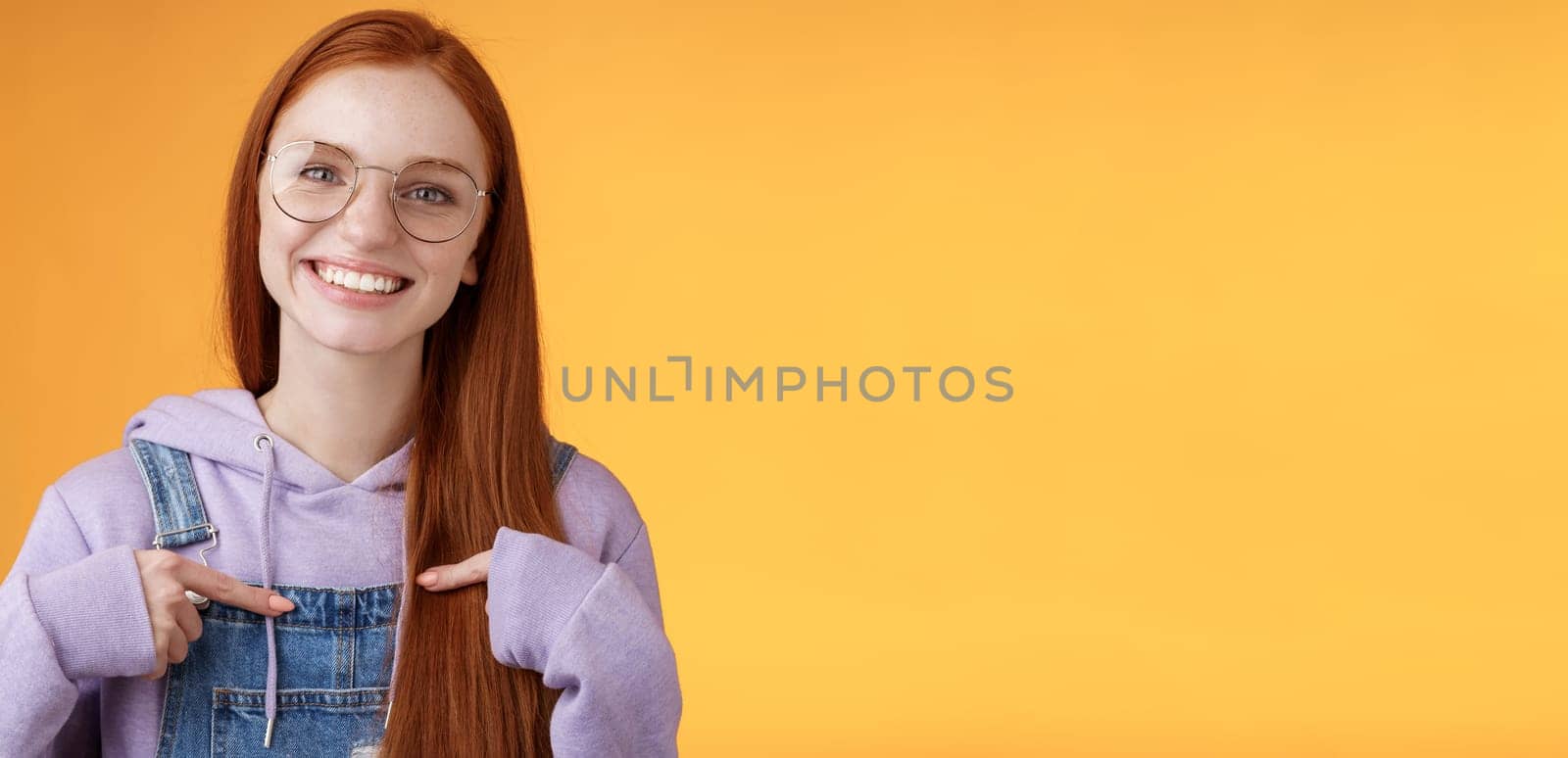 Happy lively friendly redhead european girl pointing herself suggesting help boasting telling own accomplishments smiling white teeth delighted volunteering, being picked, orange background by Benzoix