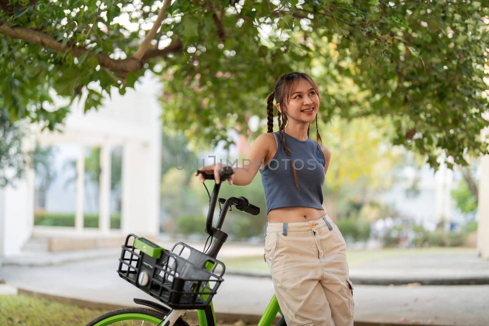 Smile asian woman lifestyle using bike in summer travel, ECO friendly.