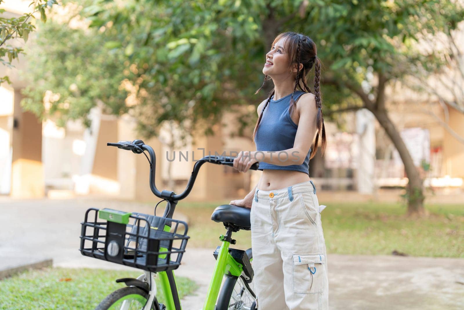 Smile asian woman lifestyle using bike in summer travel, ECO friendly.