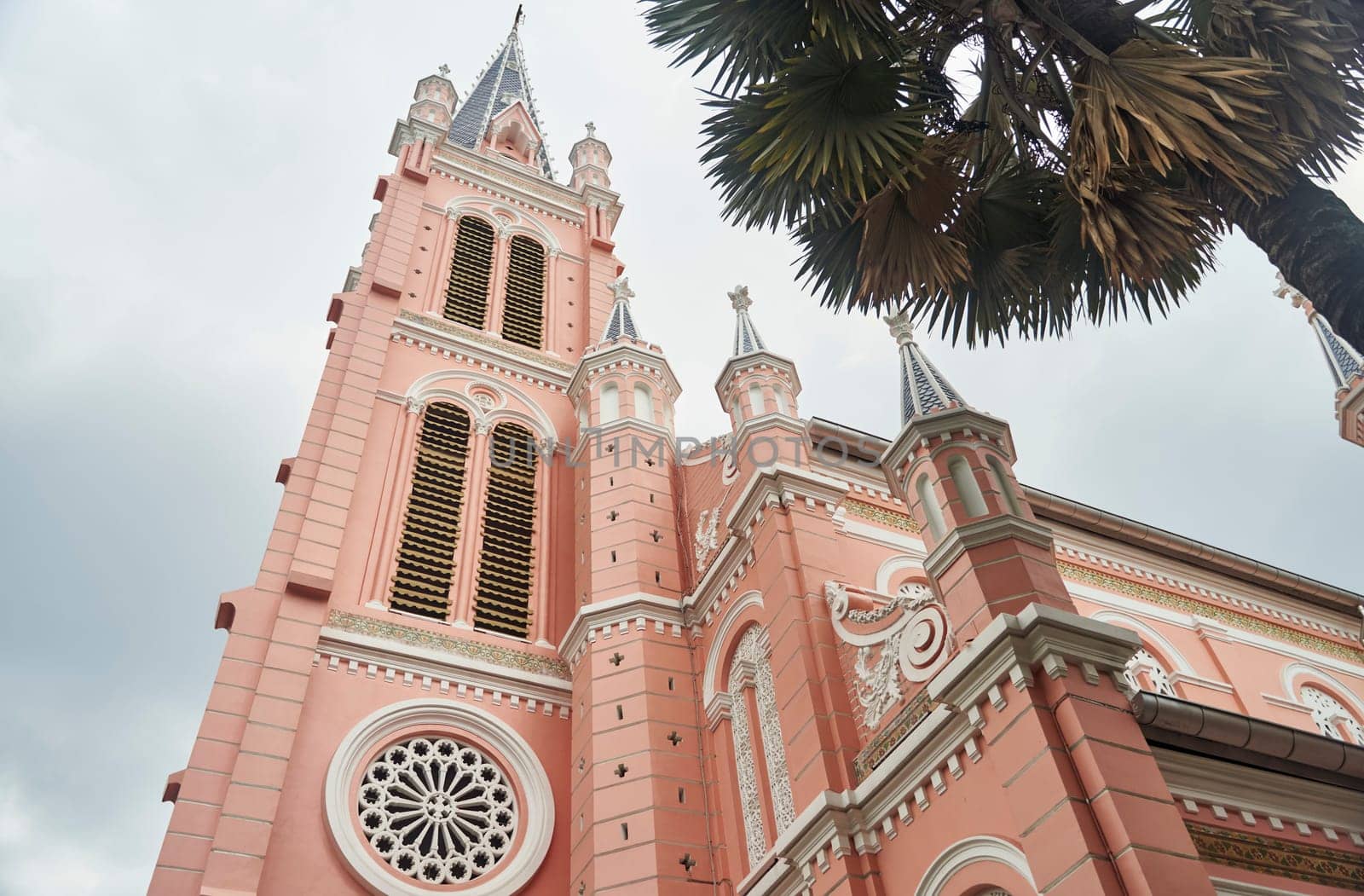 Ho Chi Minh City, Vietnam - 03.07.2023: View of the pink Tan Dinh church by driver-s